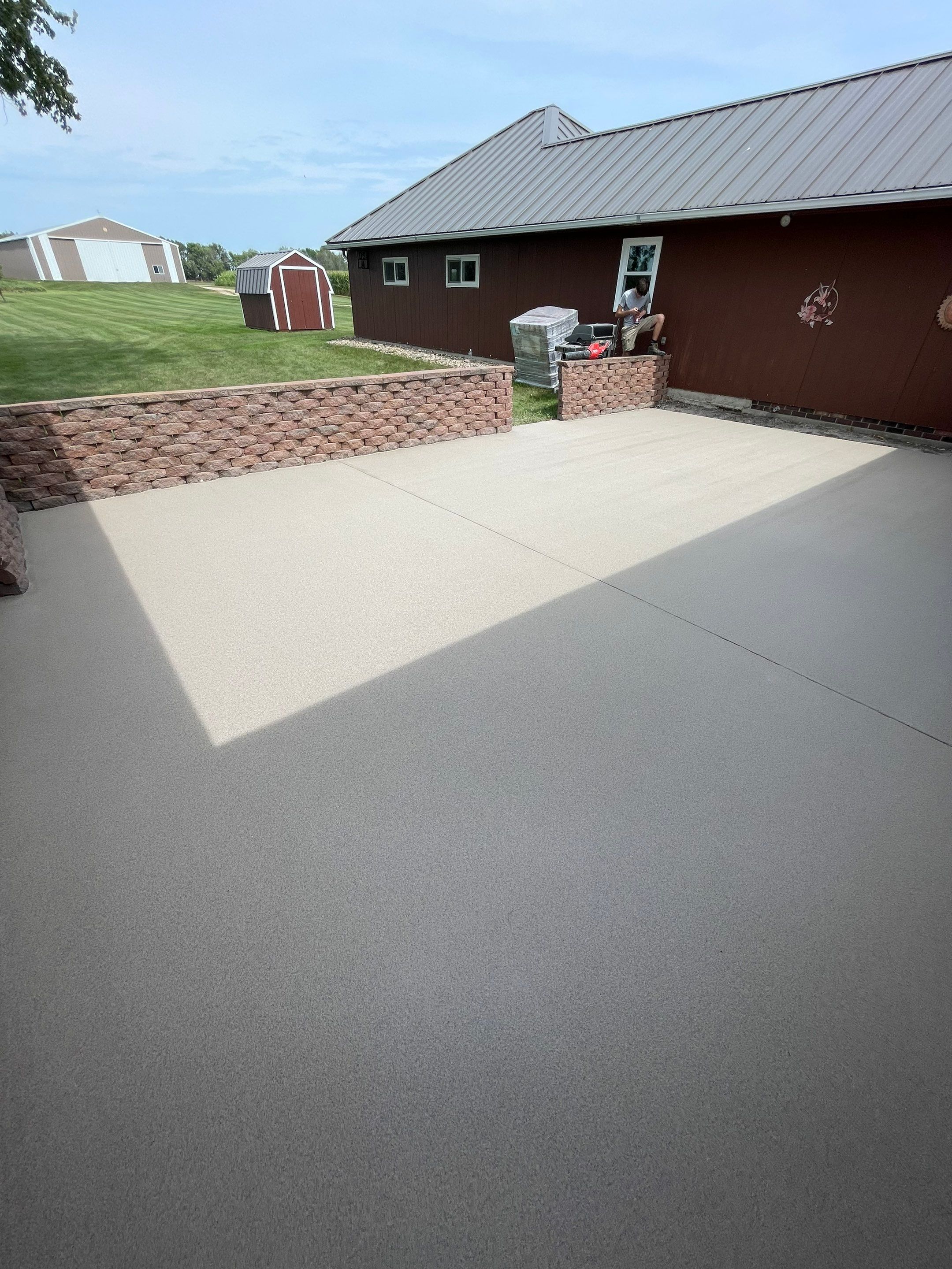 Concrete Patio Resurfacing and Protective Coating in Winfred, South Dakota by Select Painting, Coatings & Garage Cabinets