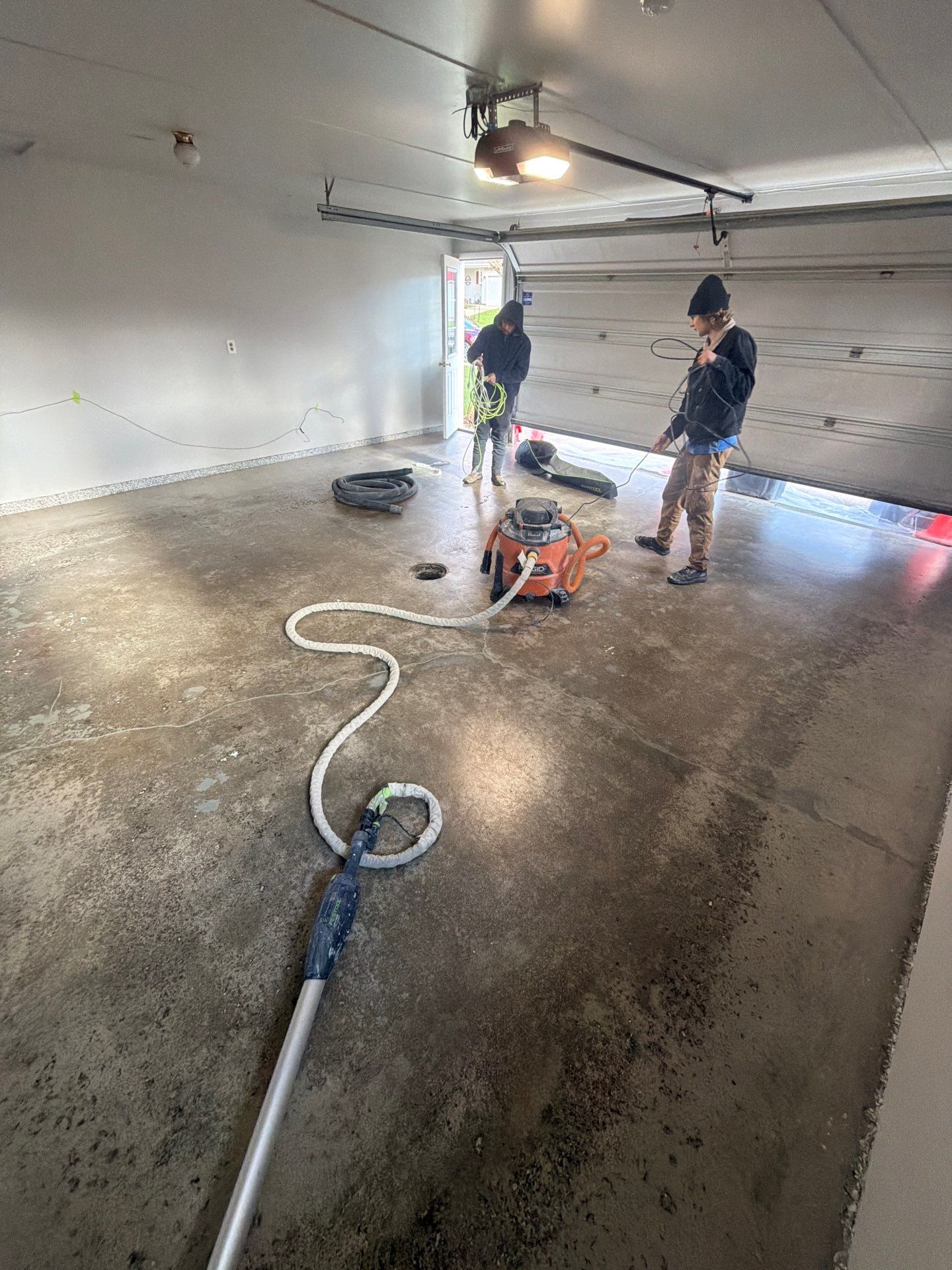 Muskegon Garage Interior Painting and Epoxy Flake Floor Installation by Gordon Painting