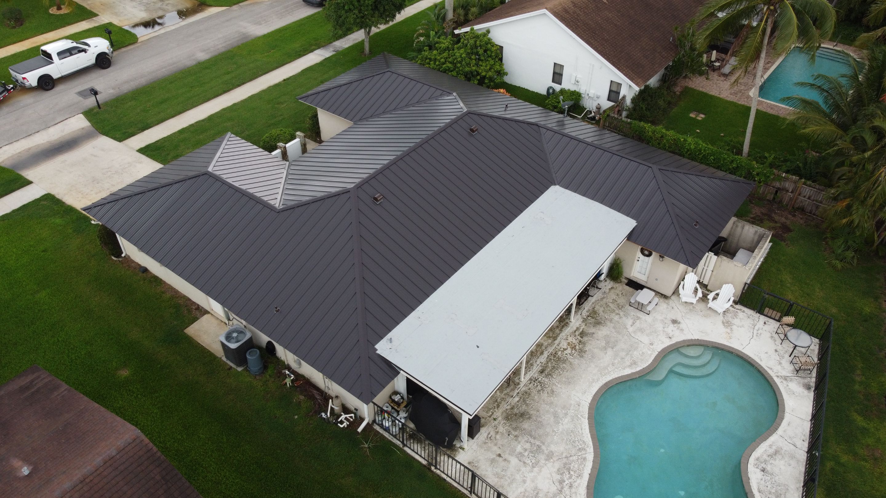 Residential Roofing Installation using 1" Nail strip metal roof by BLUES BROTHERS CONSTRUCTION CORP