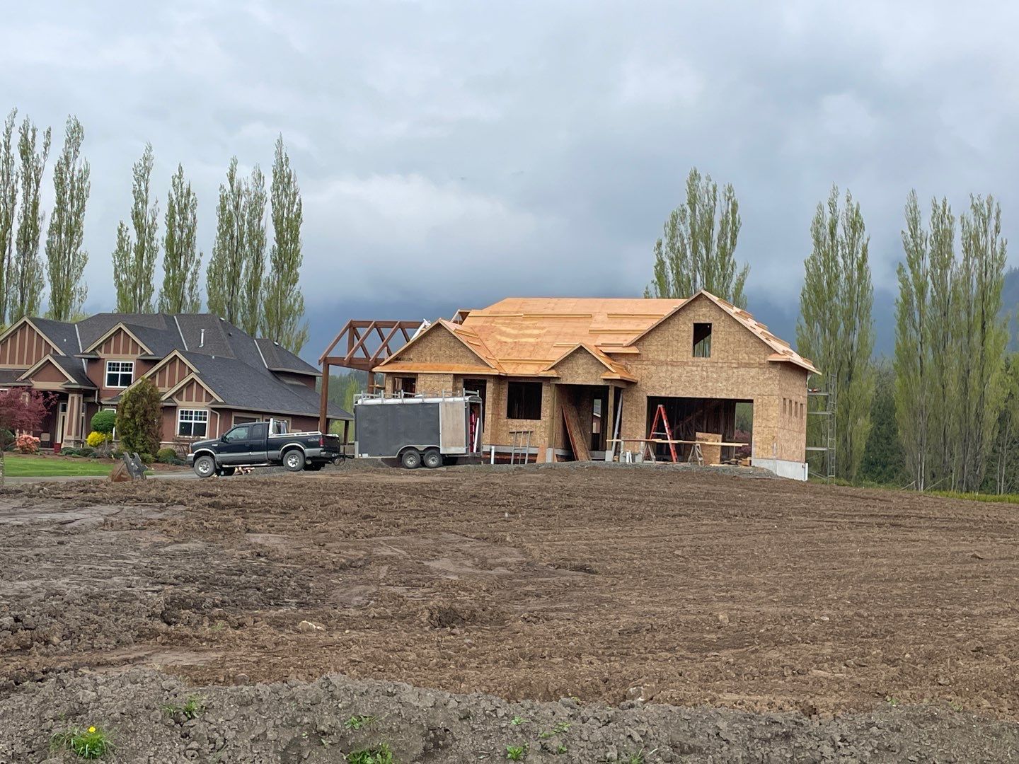 Residential Roofing Installation upgraded venting and hip and ridge capping by Top Notch Roofing Inc