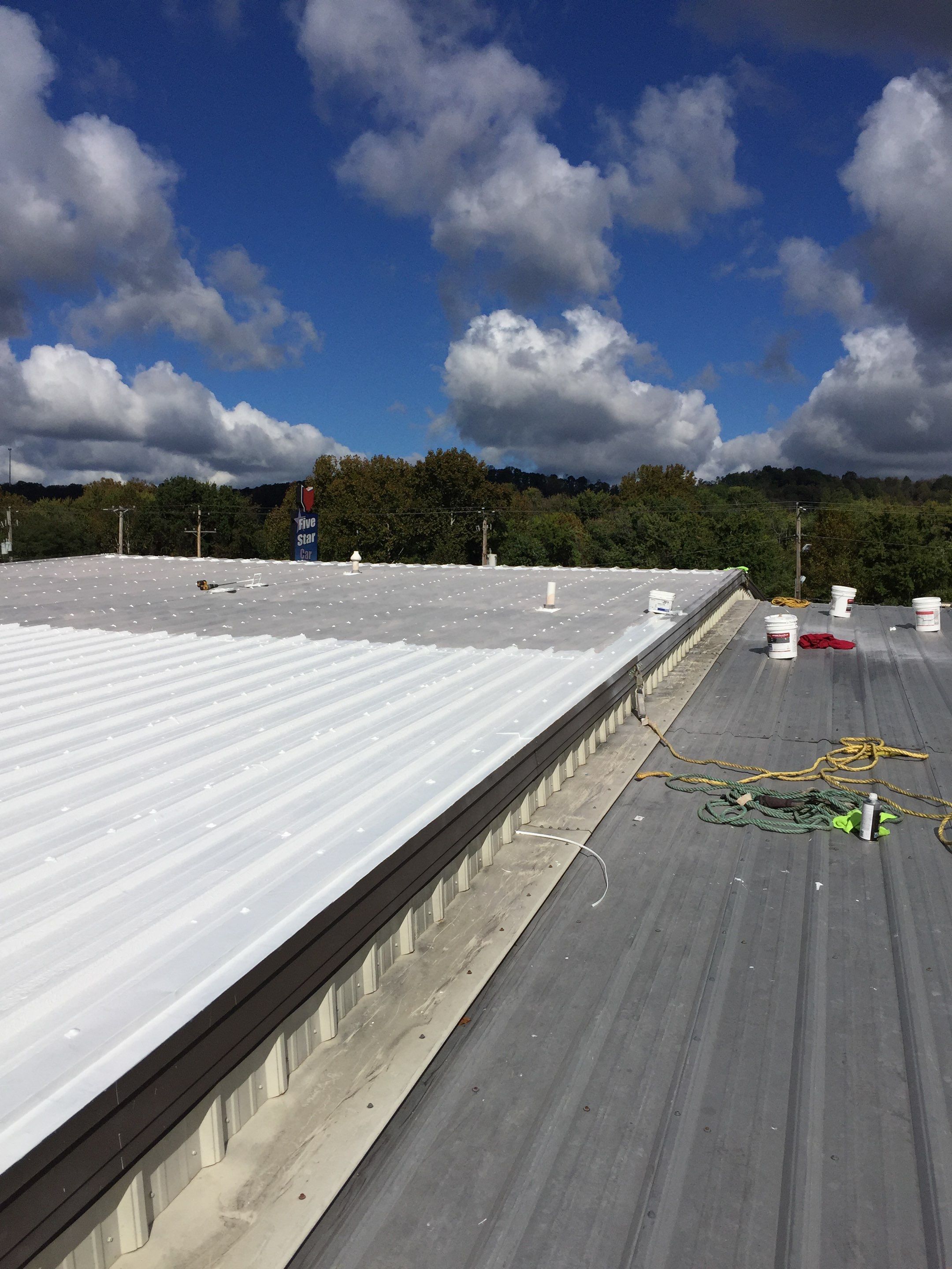Commercial Roof Coating using Gaco Silicone Roof Coating by Secure Construction Company Inc