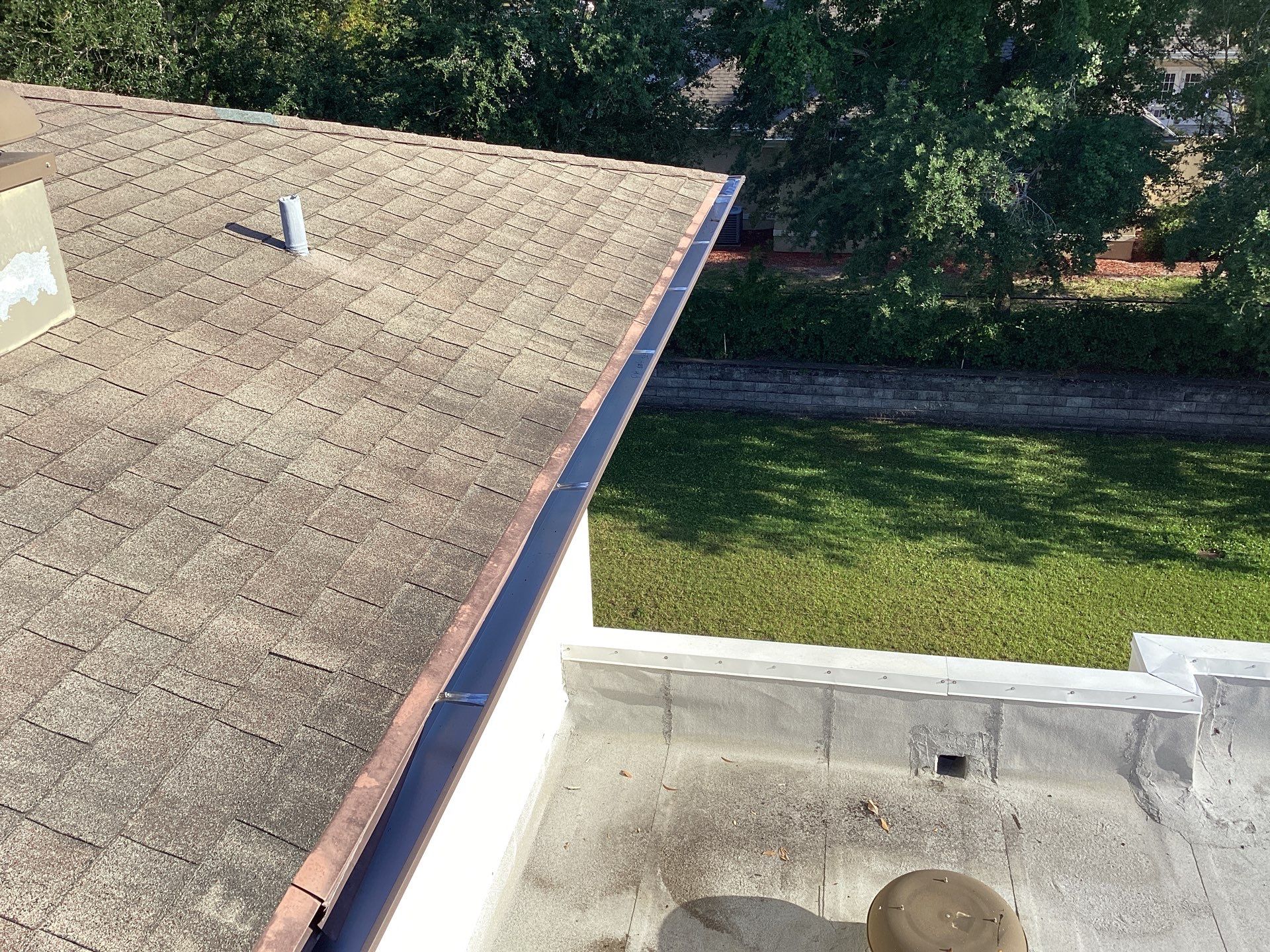 Musket Brown Seamless Gutters using Musket Brown Seamless Gutters in Capen Coral FL by Gutter Professors