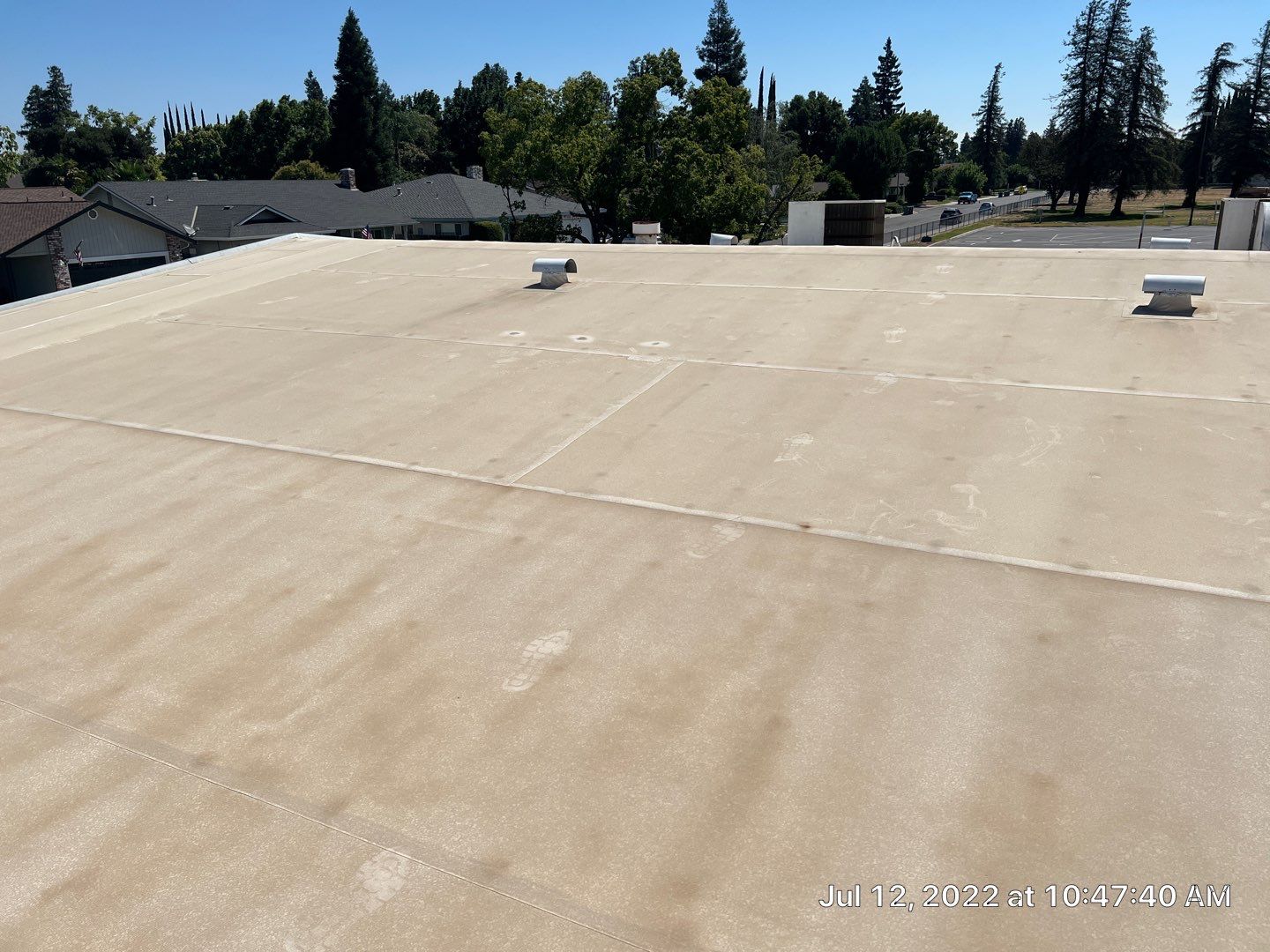 MR Roofing system using Benchmark/PUMA XL coatings over TPO single-ply roofing by Straight Edge Roofing Inc