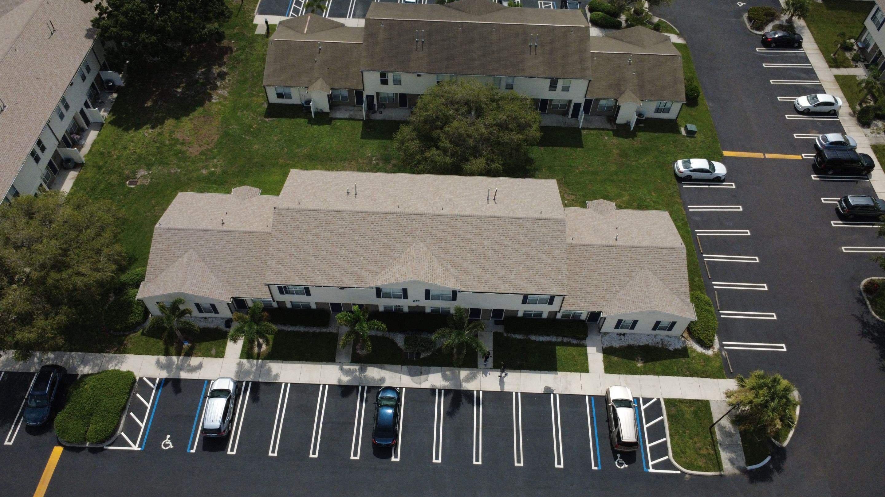 Apartment Complex Shingle Roof Replacement by Sailfish Roofing