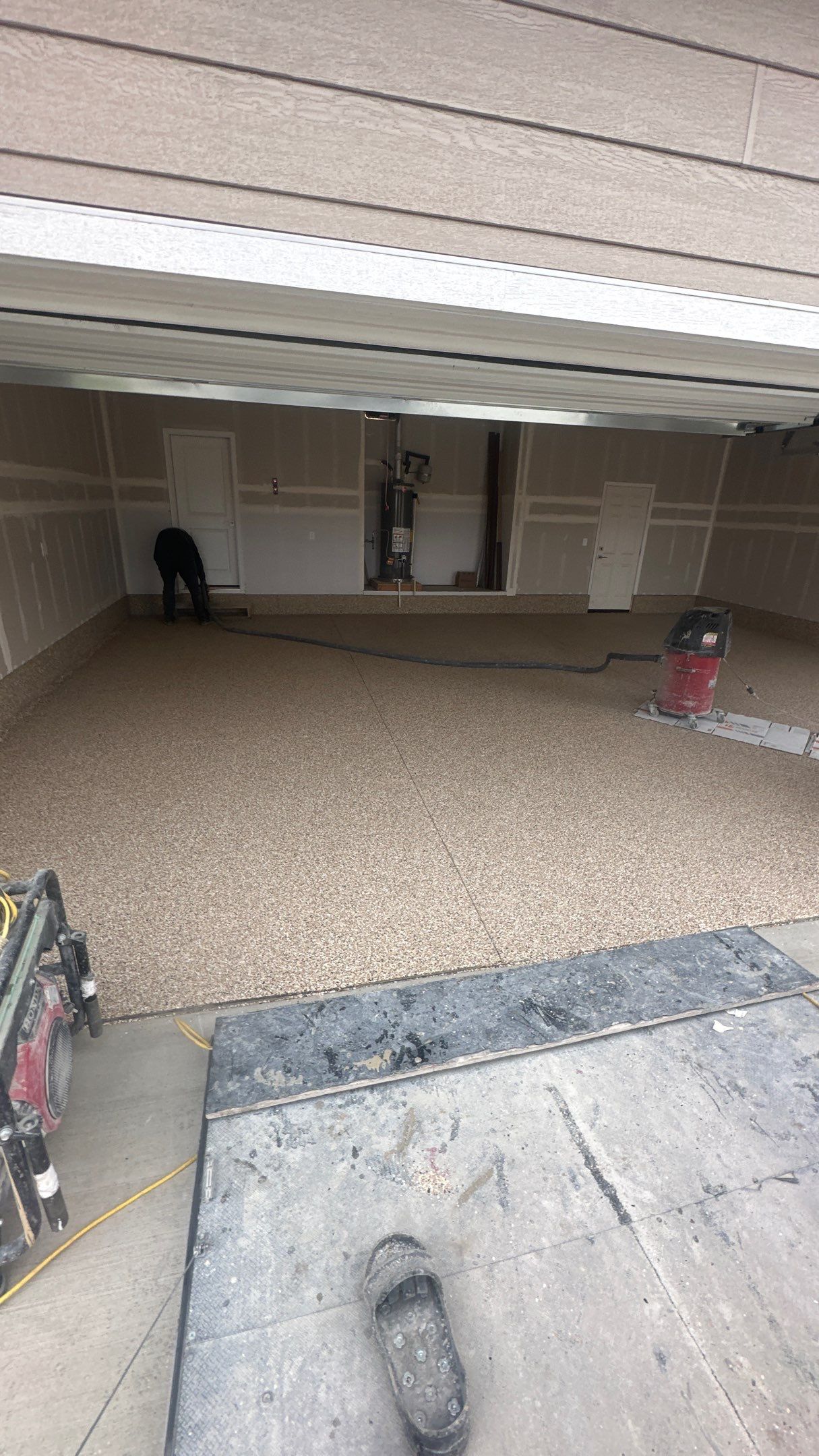Garage Transformation using Sandstone by Croc Coatings, LLC