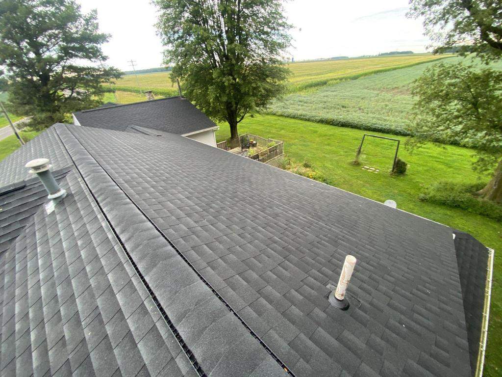 Storm damage roof replacement by Nitro Roofing and Construction