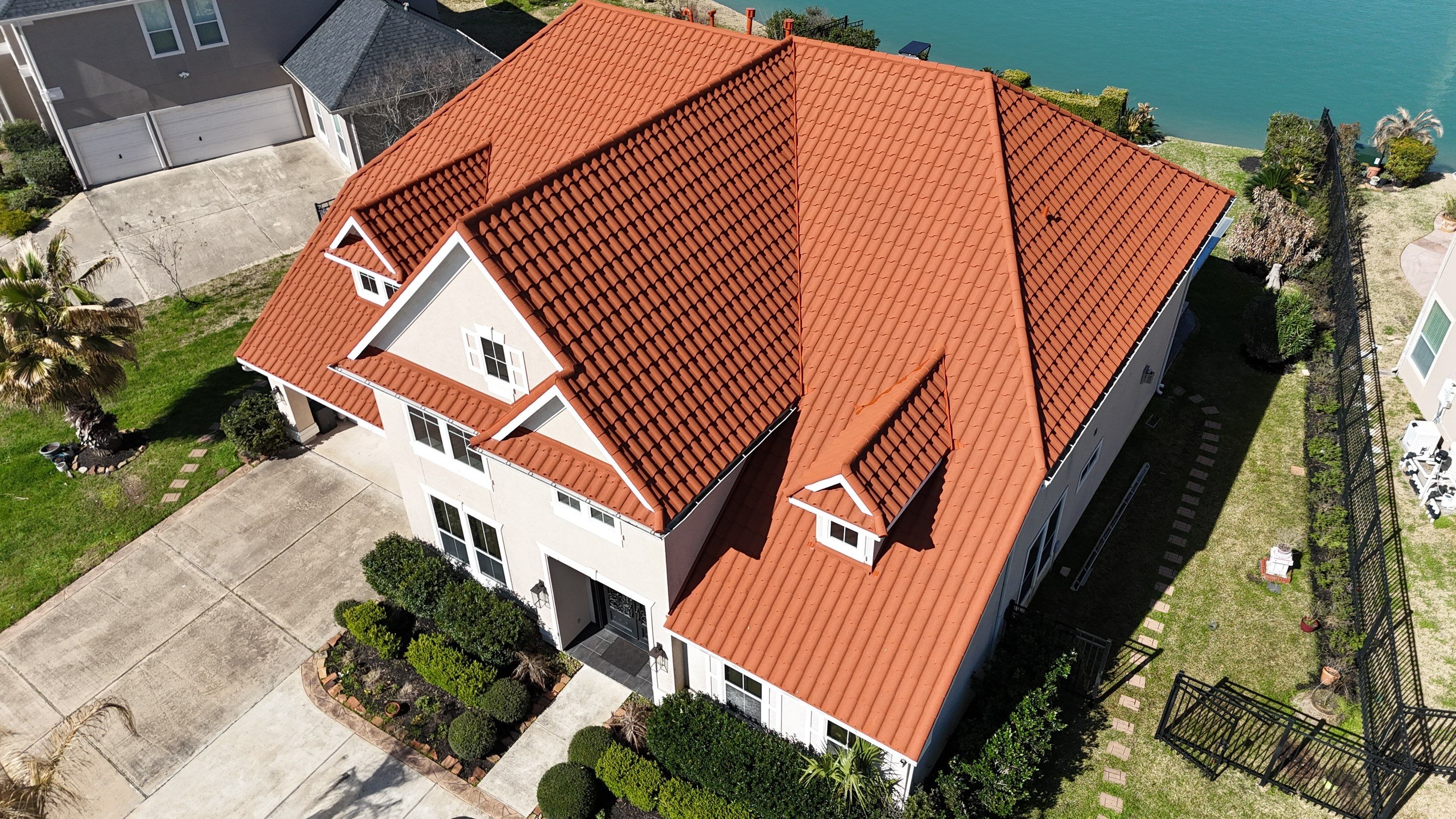 Stunning transformation using DECRA Villa Tile!  by Core Four Roofing