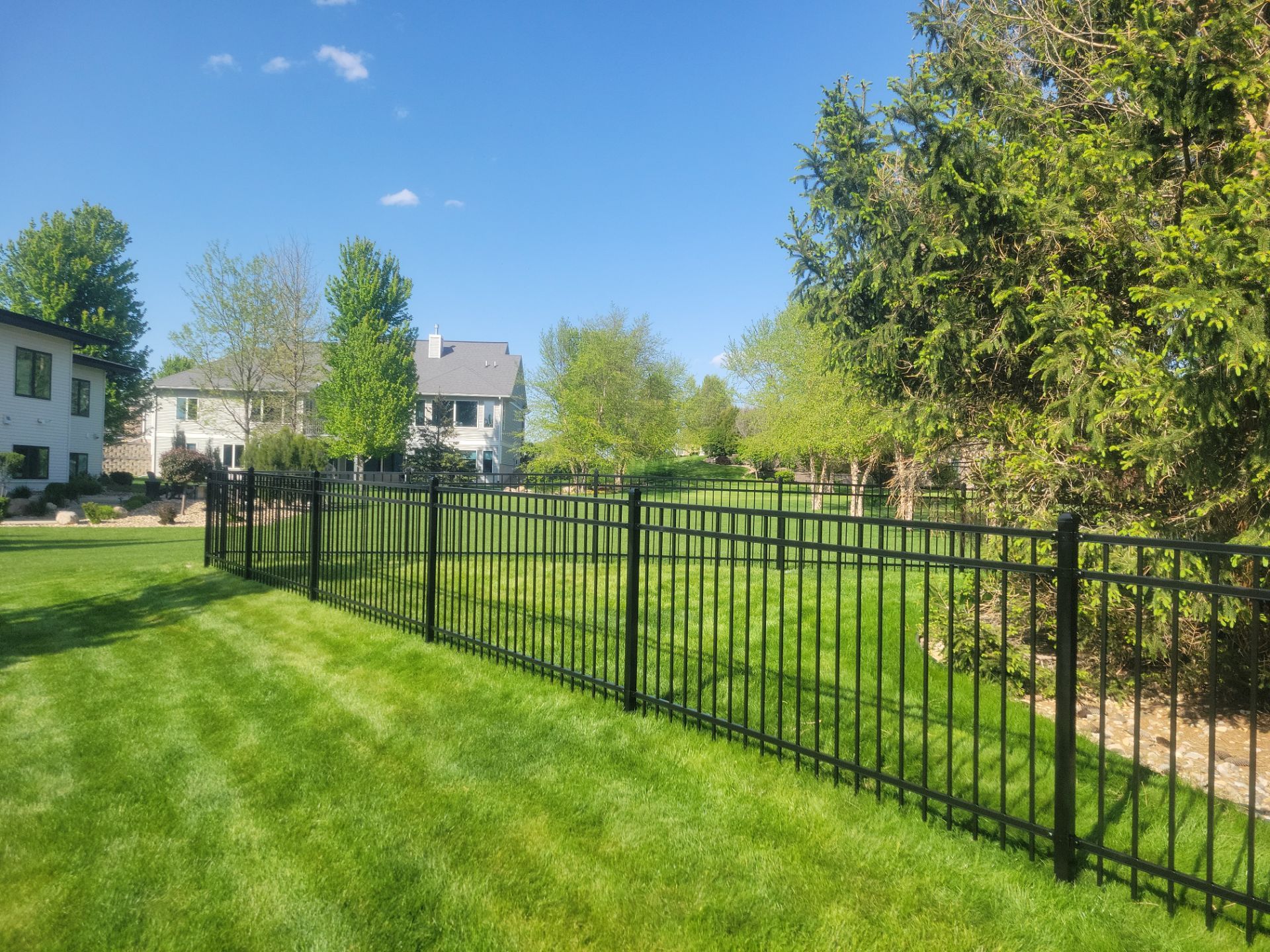 Black Ornamental Metal Picket Fence Installation in Waterloo by Perfect Picket Fence and Stain
