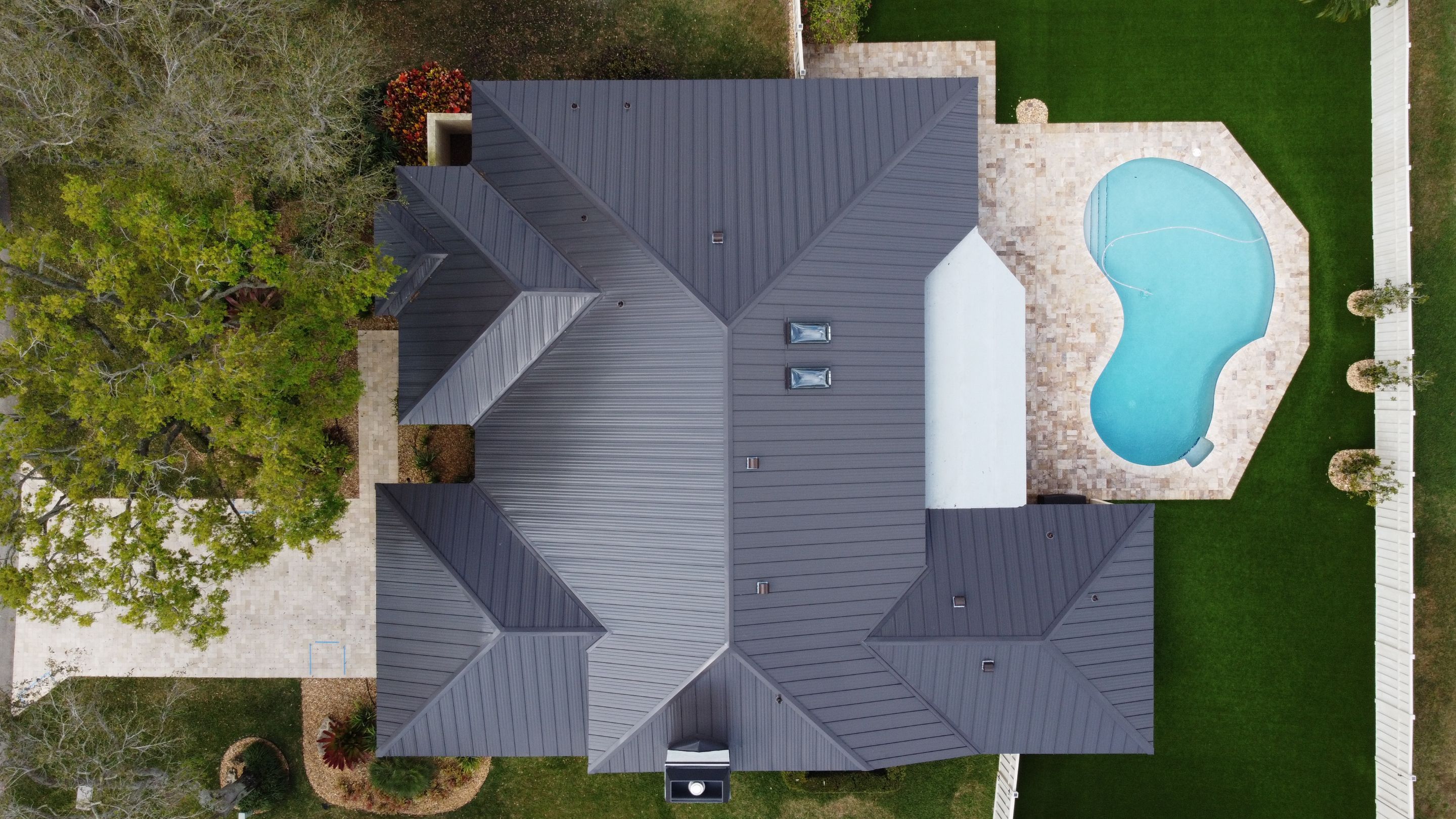Residential Roofing Installation using 1" Nail strip metal roof by BLUES BROTHERS ROOFING