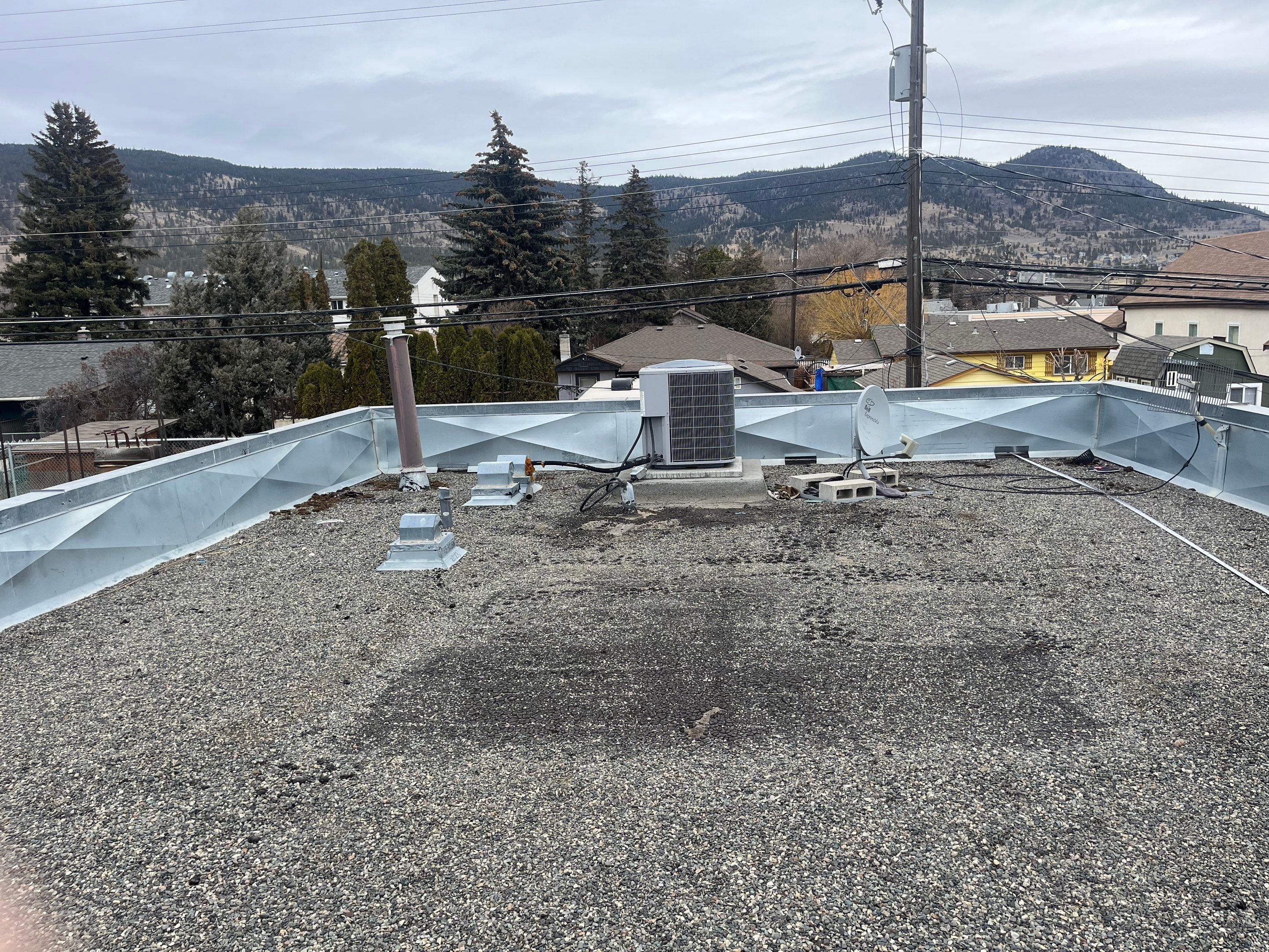 Commercial ReRoofing Installation using IKO 2ply sbs by Top Notch Roofing Inc