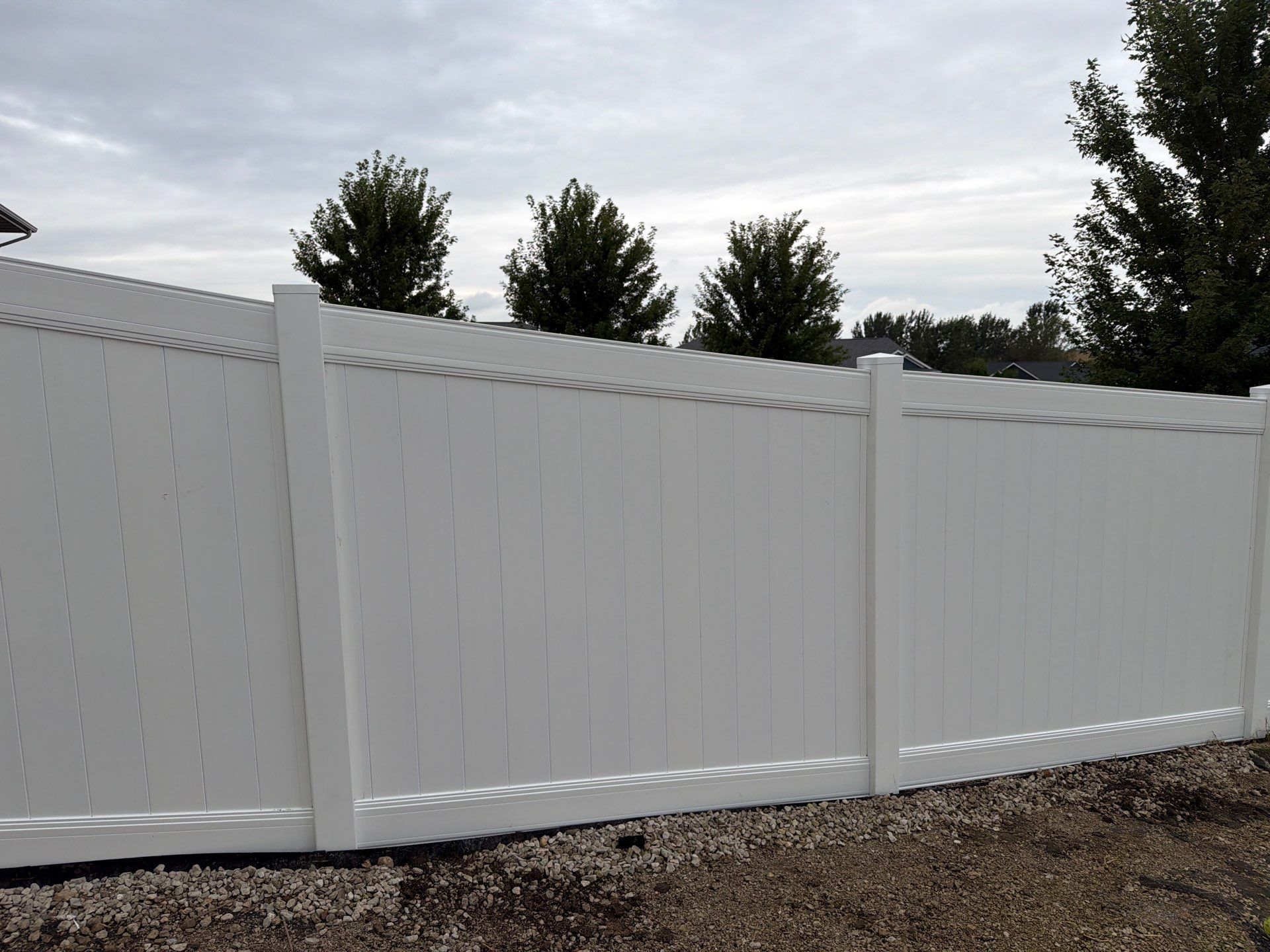 Residential Vinyl Privacy Fence Installation in Urbana by Perfect Picket Fence and Stain