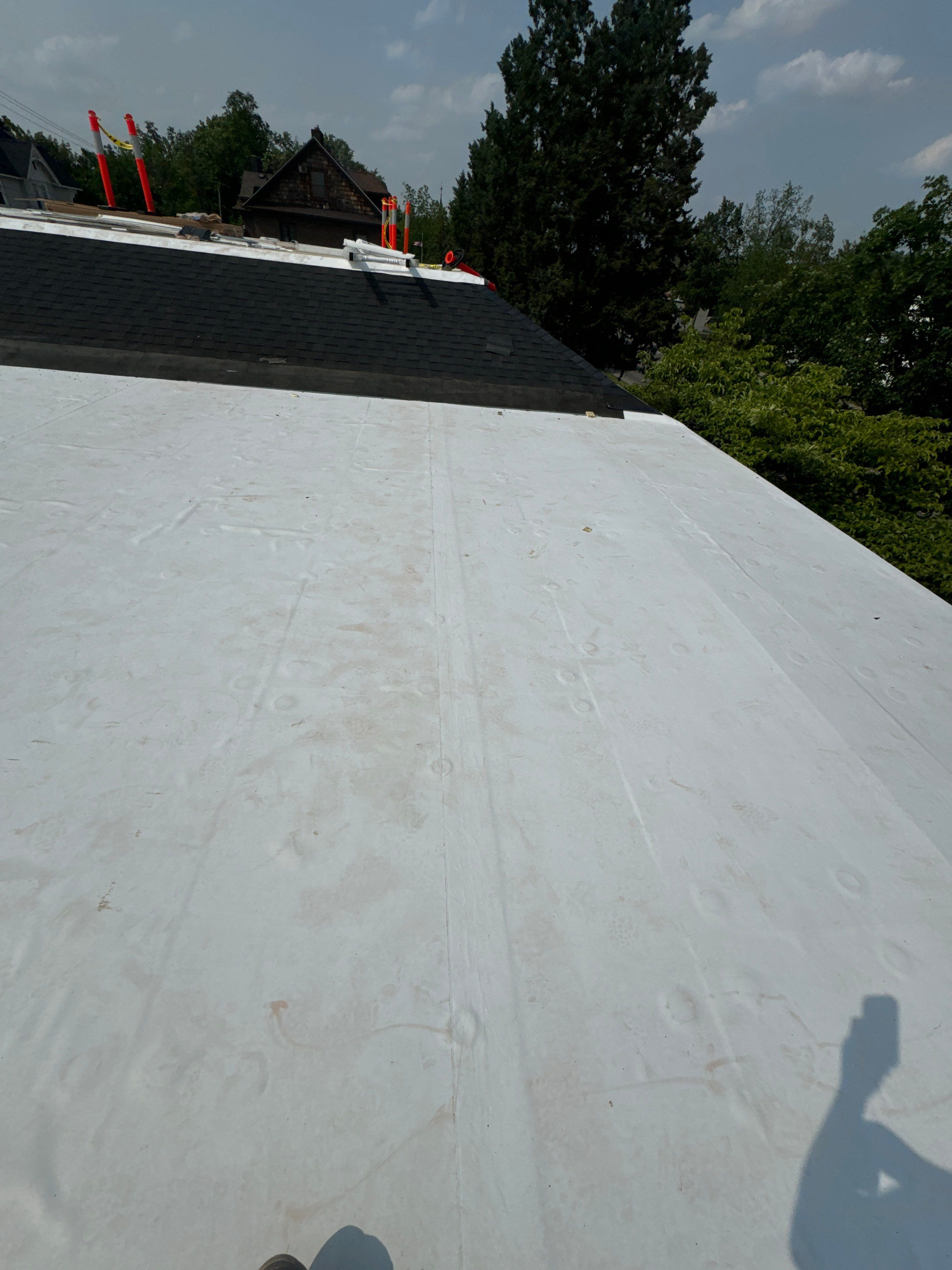 Commercial Flat and Shingled Roof Project by 42 North Construction, LLC.