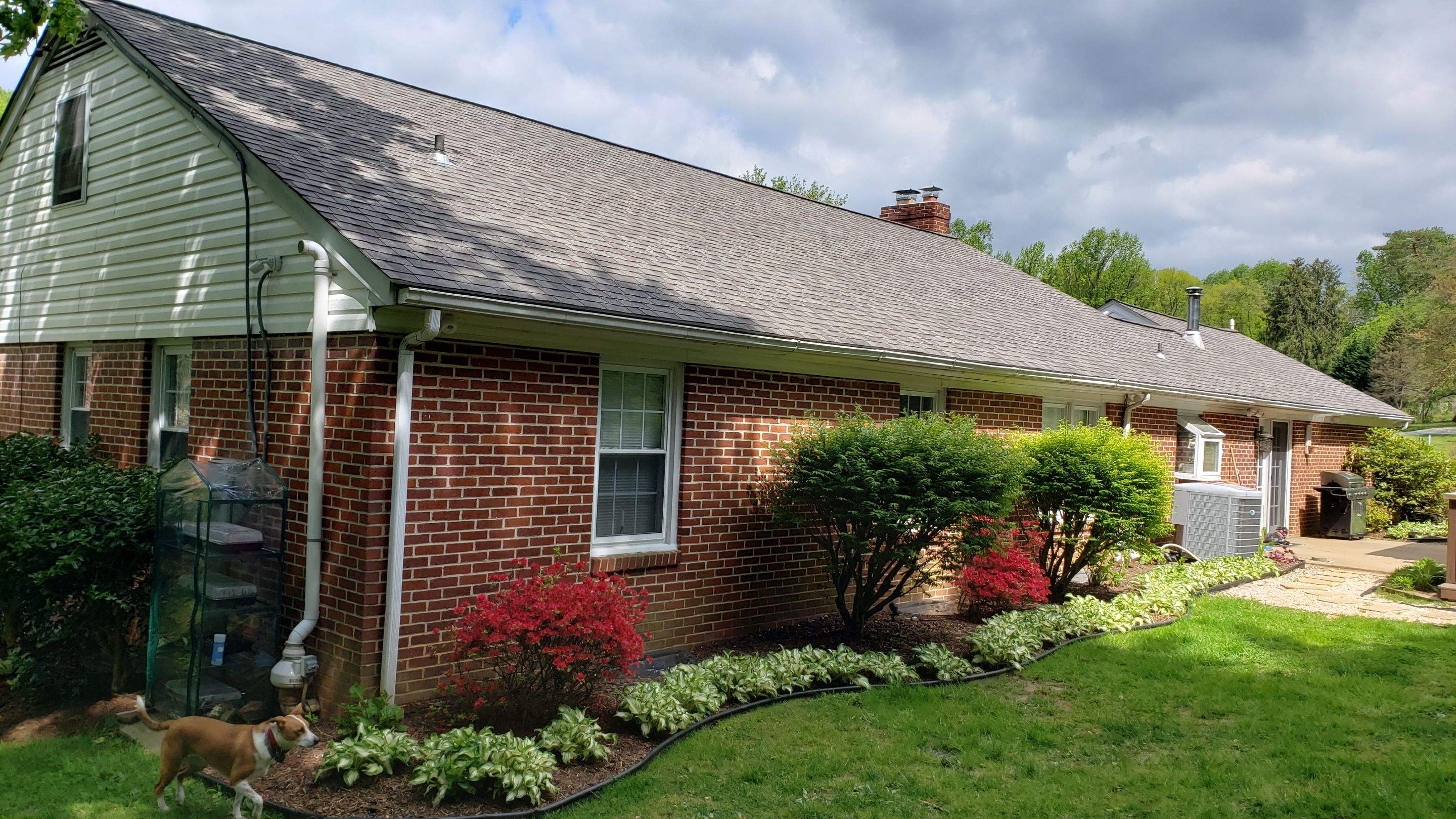 Gutter and Siding Replacement by American Home Contractors