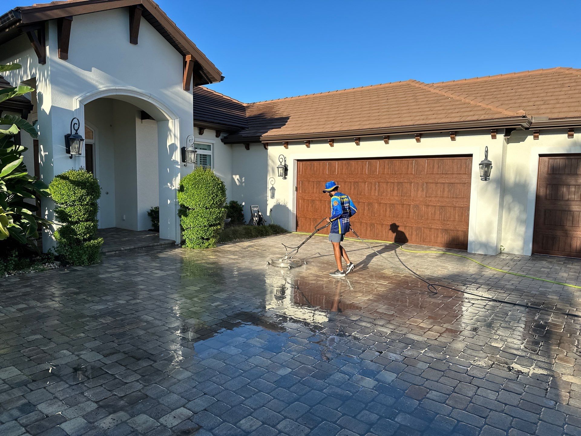 Paver Driveway, Sidewalk, and Pool Deck Cleaning in Winding River Community, Bradenton, FL by Sunshine AquaWash