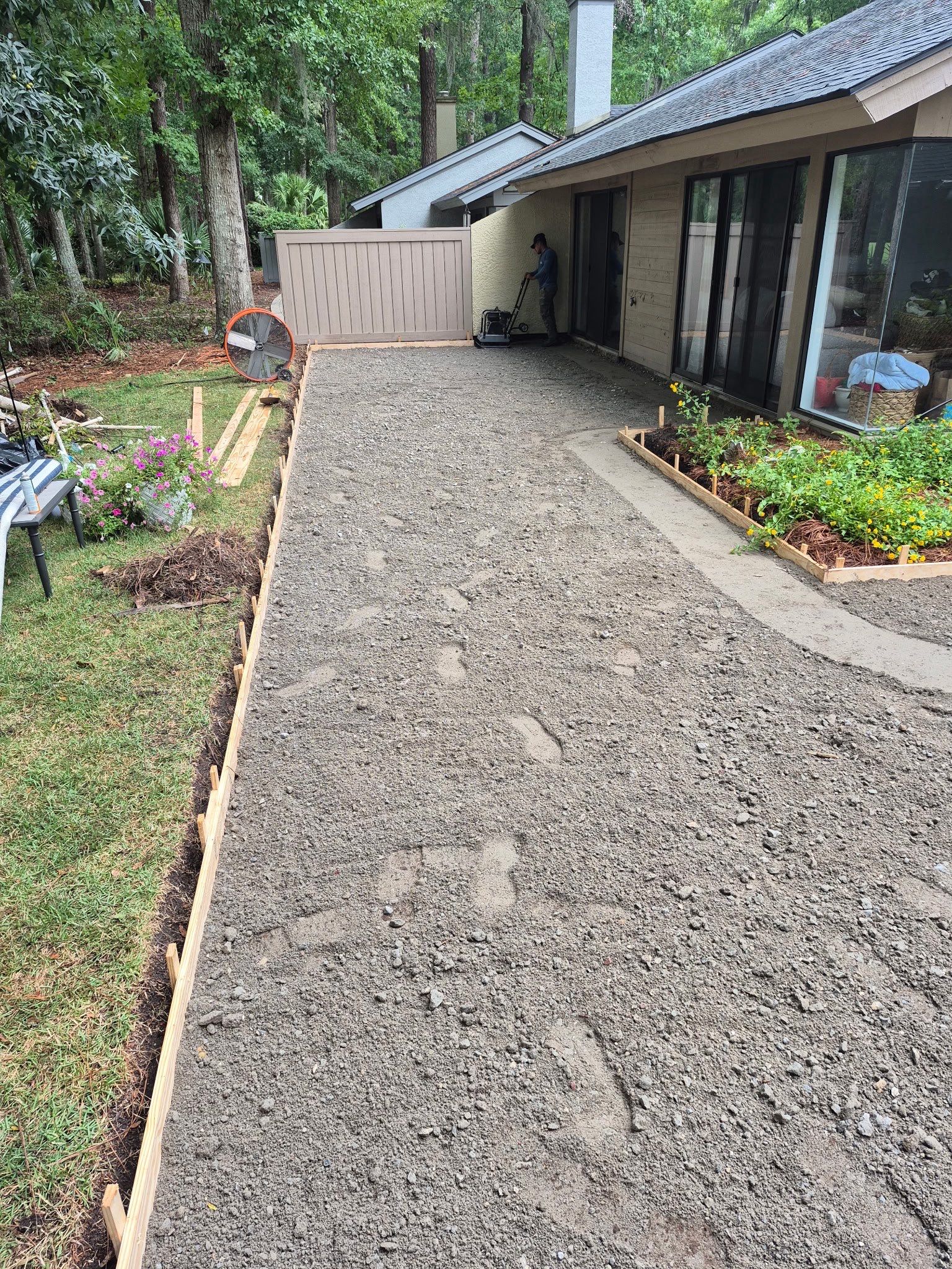 Custom Concrete Patio and Herringbone Paver Walkway in Hilton Head Island by Lowcountry Scapes, LLC