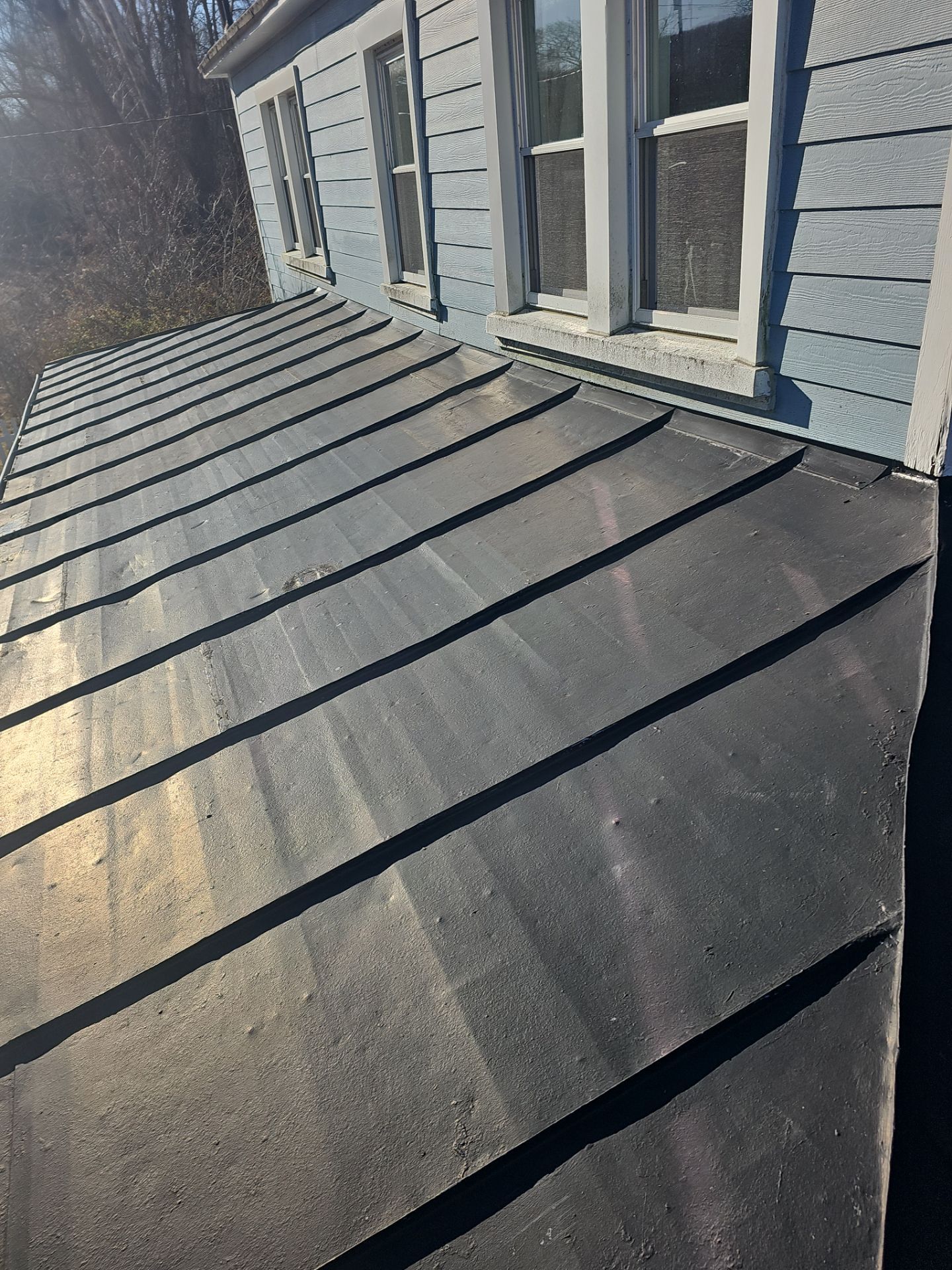 Metal Roof Replacement by Winchester Roofing