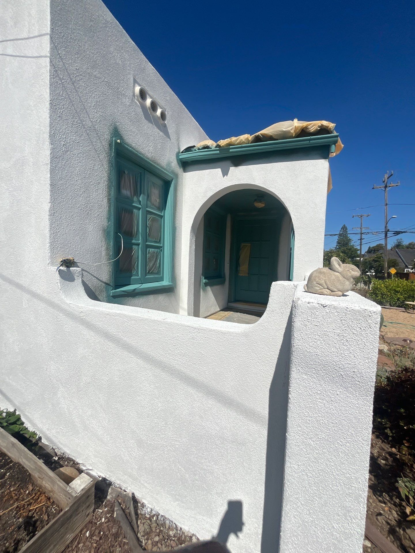 Exterior Transformation with Fresh Stucco and elastomeric system for waterproofing by Herrera’s Bay Area Painting inc.