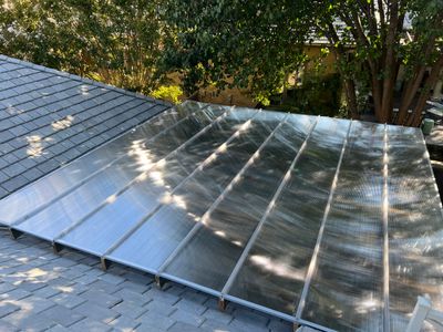 Residential Roofing Installation using Polycarbonate Pergola Roof Panels