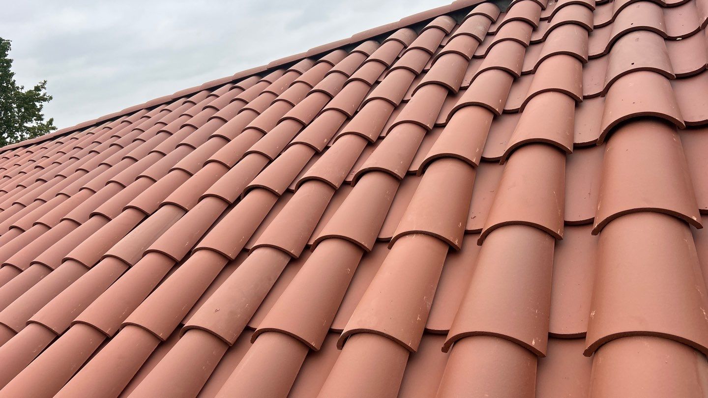 Spanish-Style Roof Replacement with Integrated Solar in Altadena by Reliable Roofing San Diego Inc.
