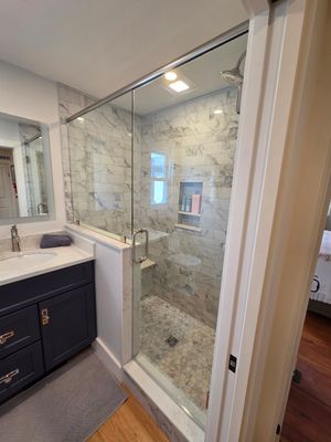 Frameless Shower Enclosure with Header Bar