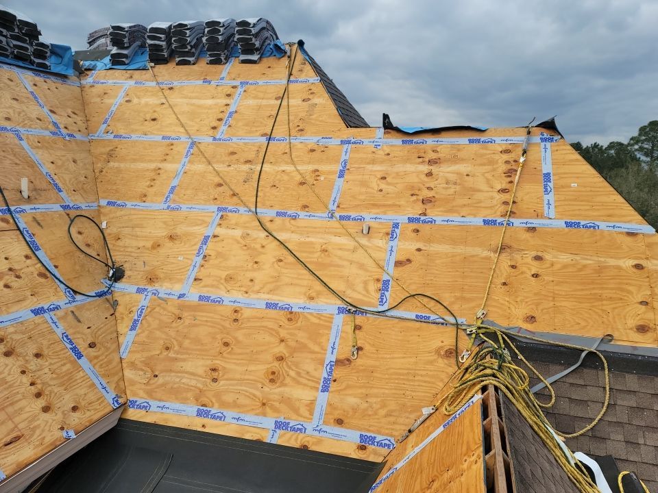 Residential Roofing Installation using Roof Replacement by American Roofing & Construction LLC