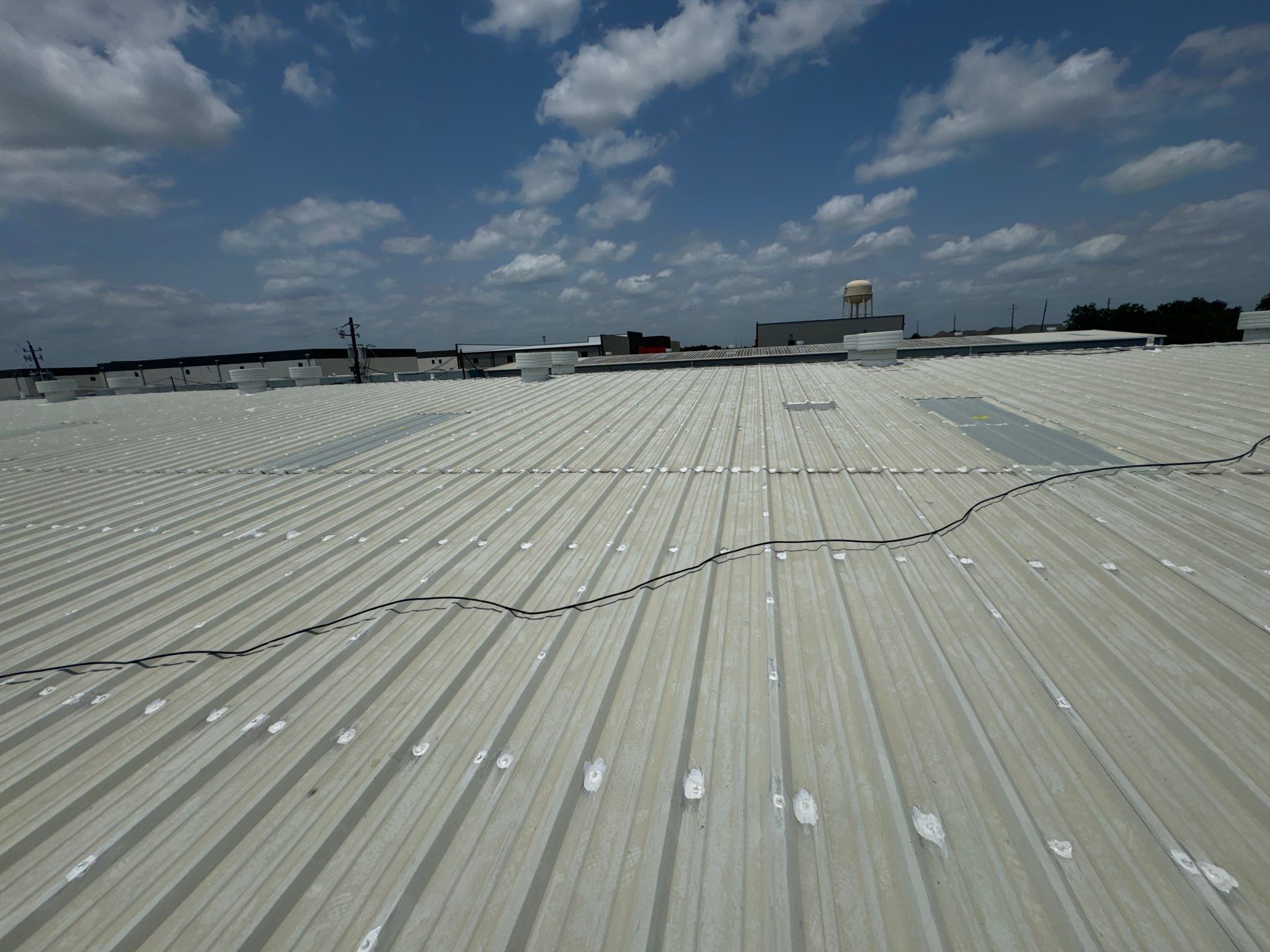 Metal Roof Maintenance- Skylight Installation by Associates Roofing Unlimited