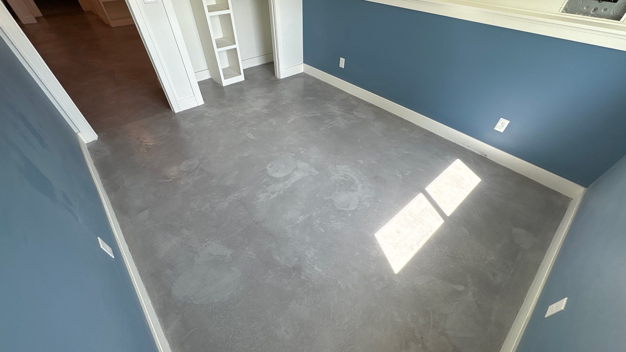 Basement Floor Overlay - Lawrence, KS by Big Red Decorative Concrete, LLC