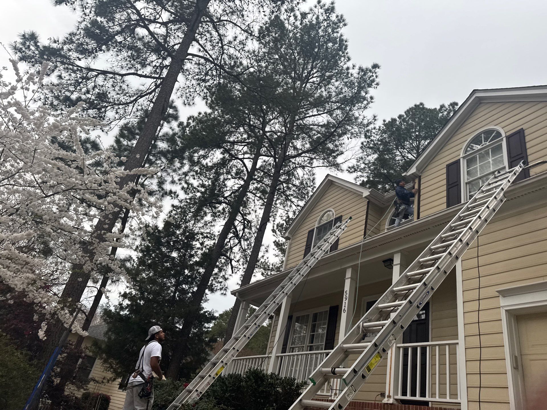 Exterior paint and siding replacement by GonzalezPainters & Contractors Inc 