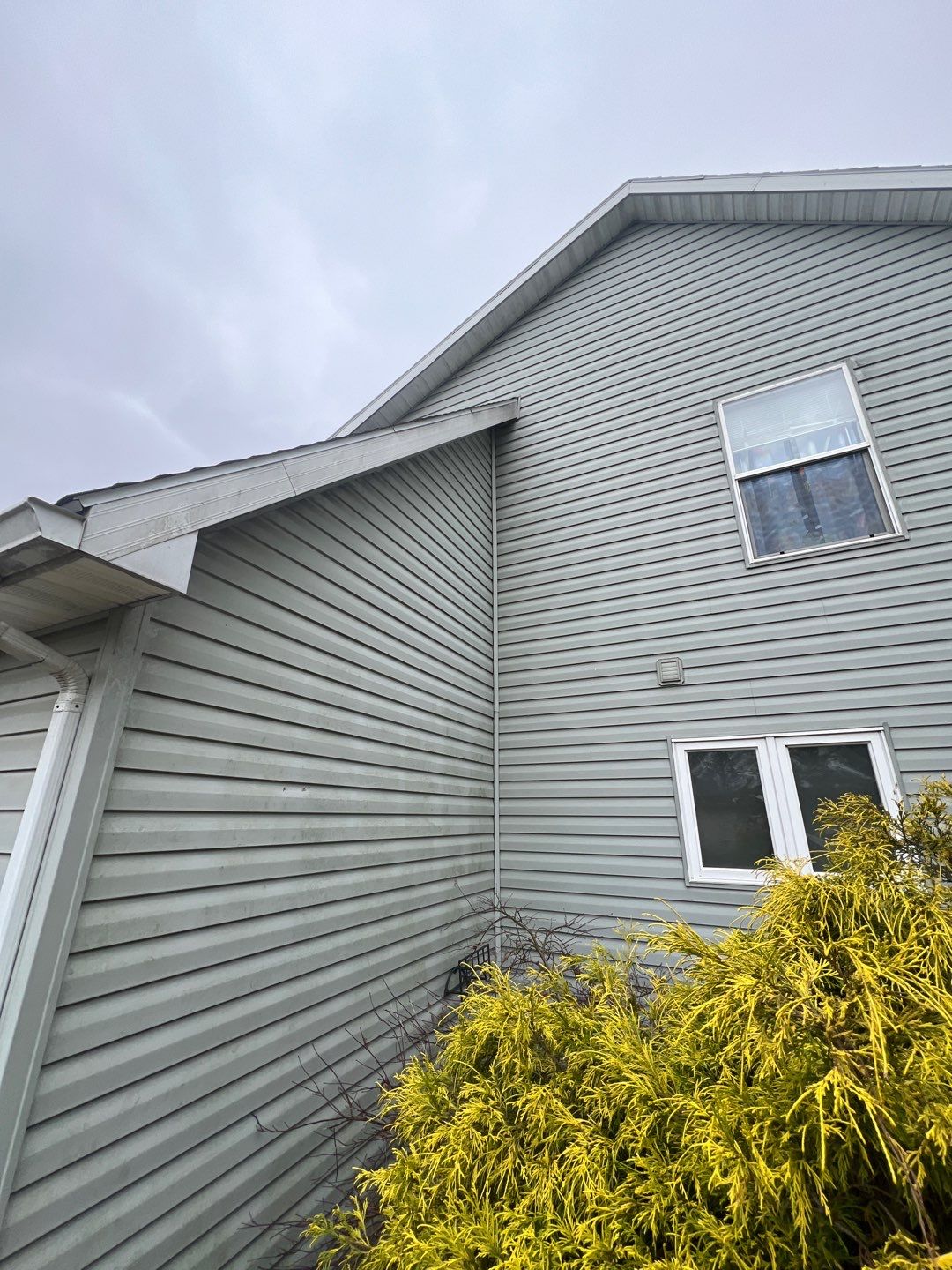 Exterior Installation using Onyx Black Durations and White Siding by WIW Enterprises Inc