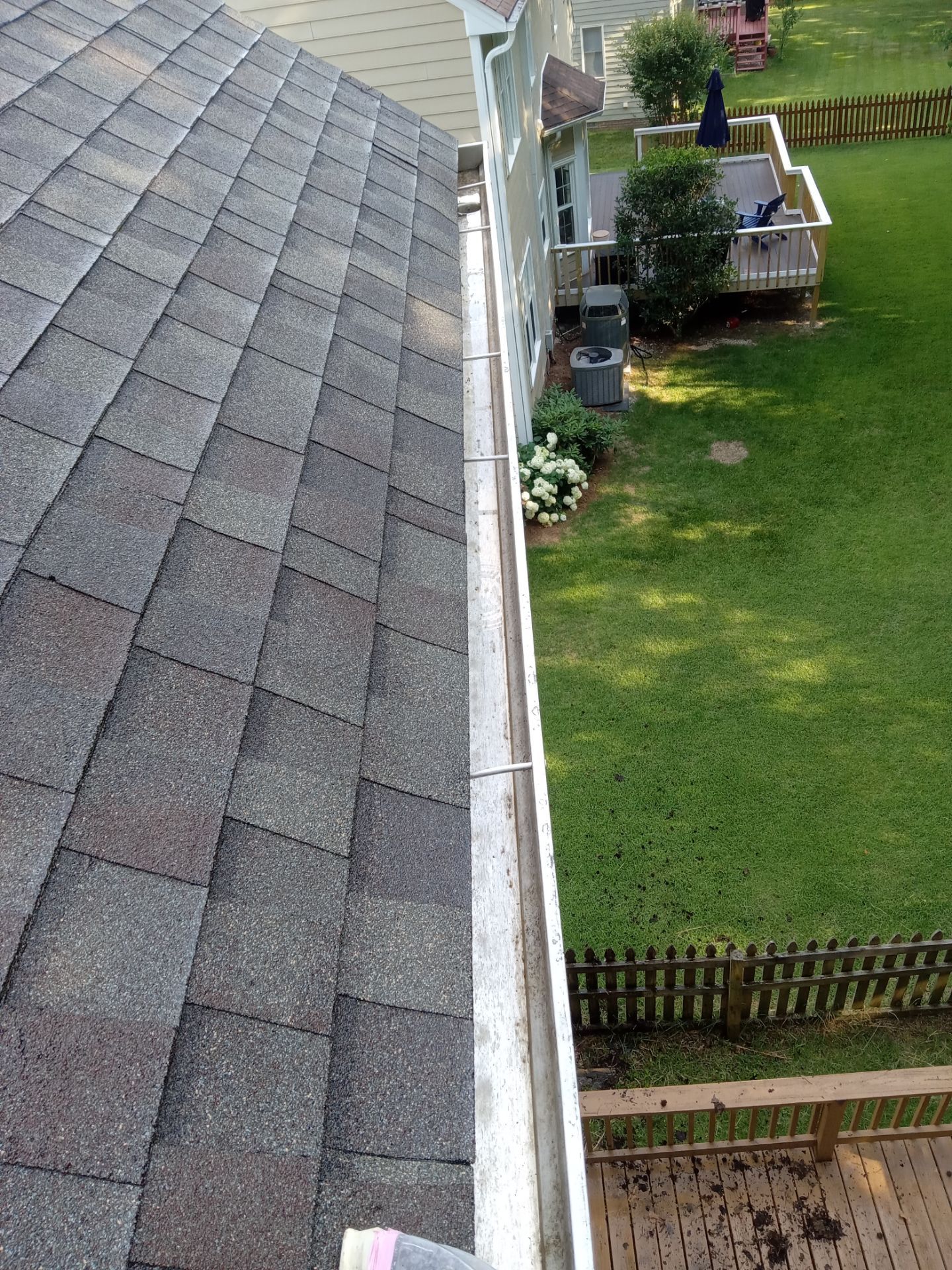 pressure washing roof siding gutters deck removing dirt algae buildup restoring surfaces aesthetic