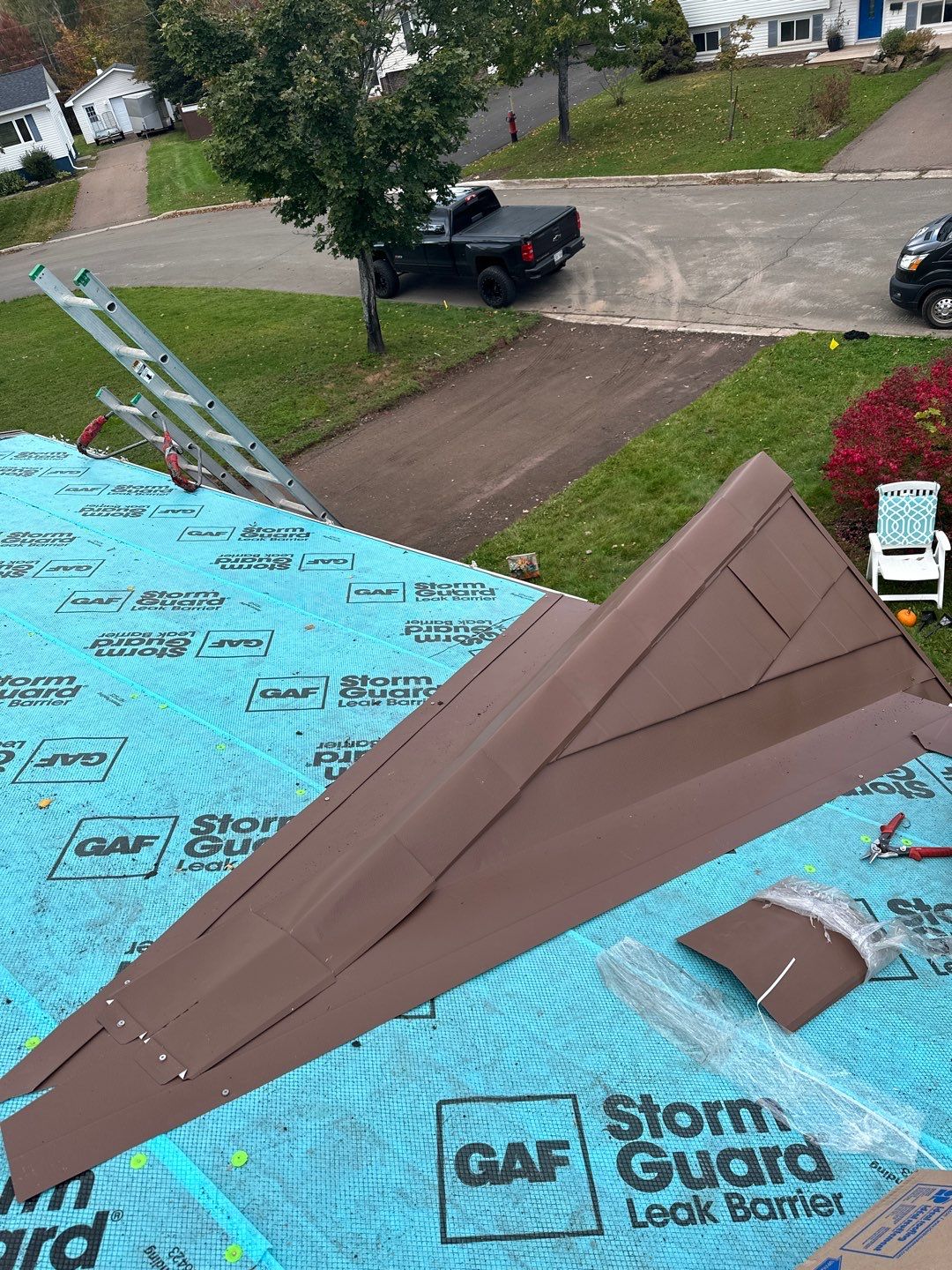 Residential Roofing Installation using Wakefield Bridge Steel Shingle by Ideal Steel by Artisan Roofing & Home Improvements Inc.