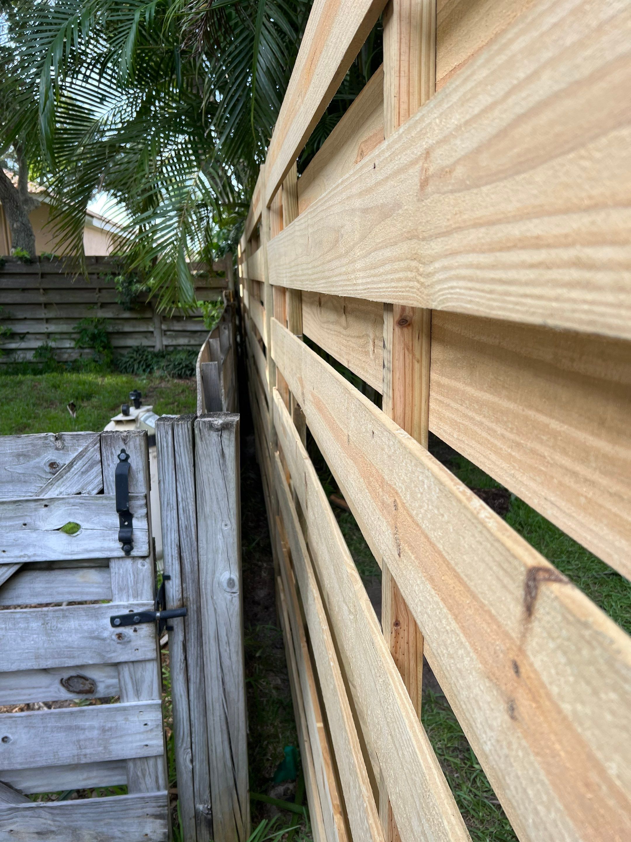 Osprey, FL 6ft. Tall Treated Horizontal Shadowbox Wood Fence by Asap fence and gates, LLC