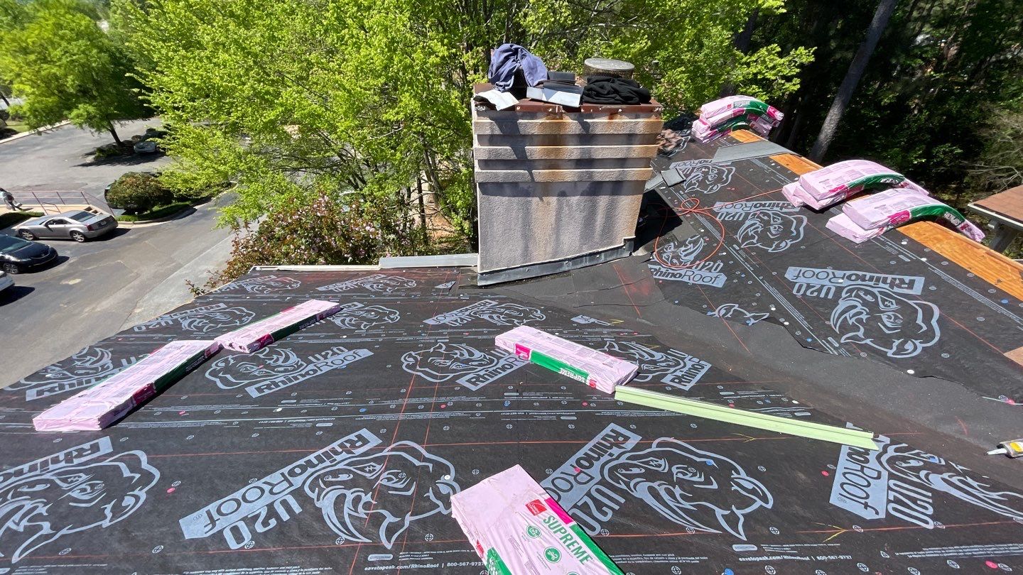 Commercial Roofing Installation using Owens Corning Autumn Brown by Inspector Roofing and Restoration