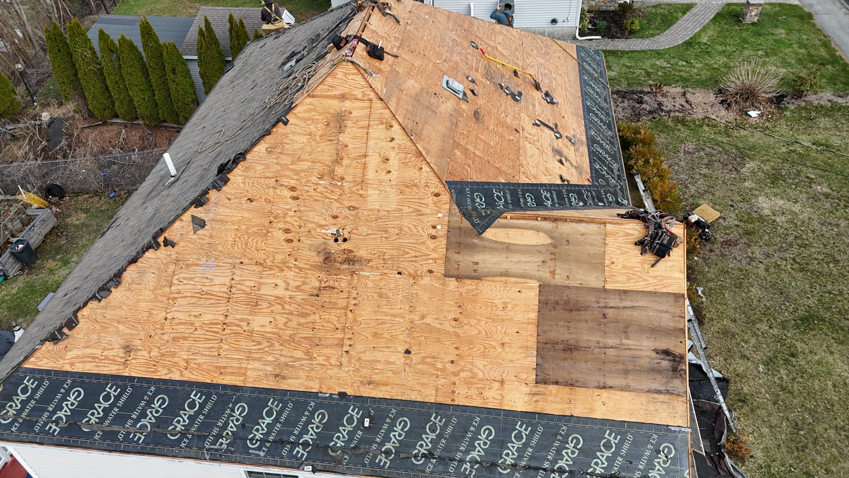 Full Roof Replacement + Seamless Gutters by Mighty Dog Roofing of Greater Middlesex County