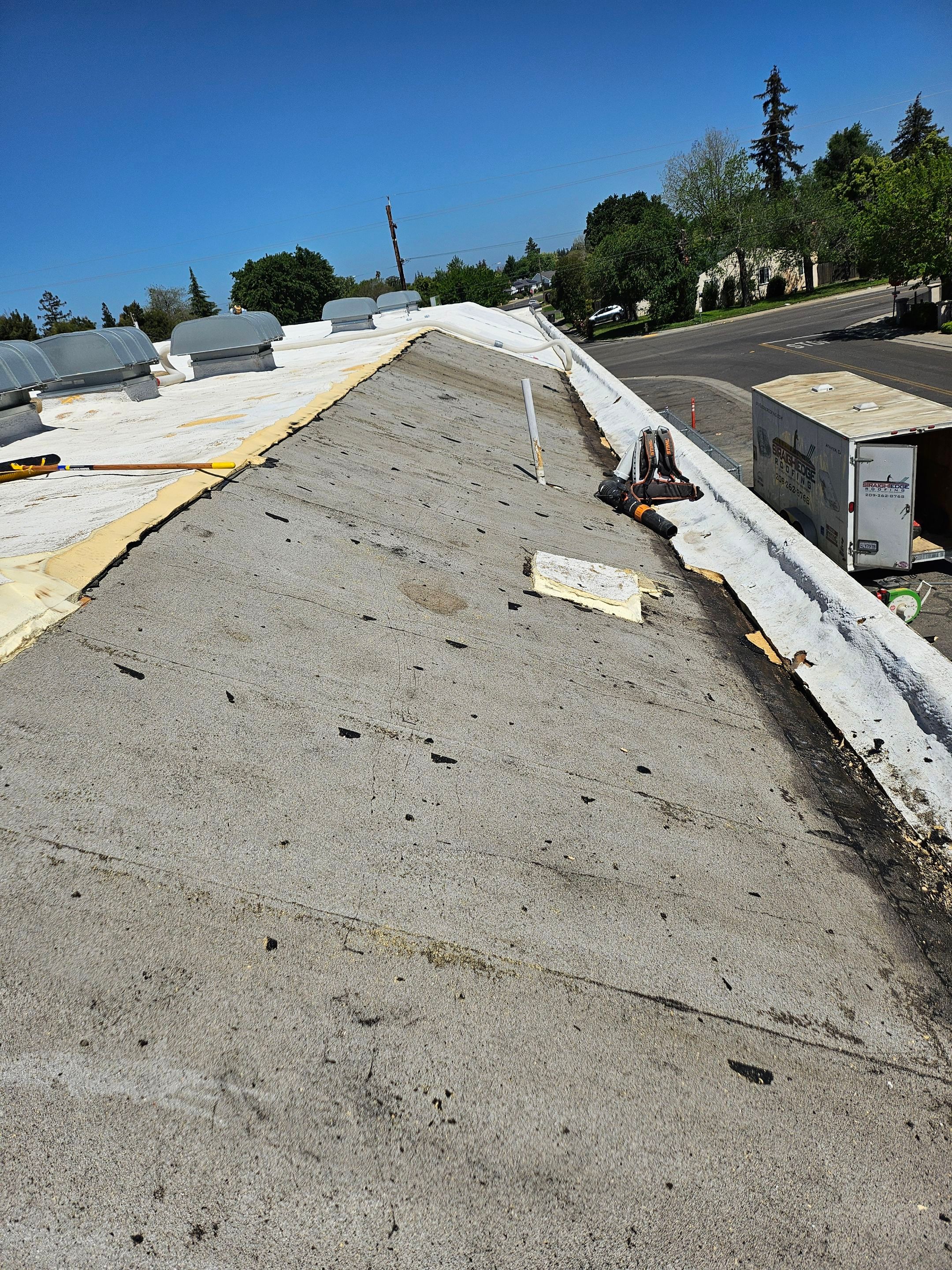 Foam Refurbish using Conklin Benchmark/PUMA XL coatings and spray foam by Straight Edge Roofing Inc
