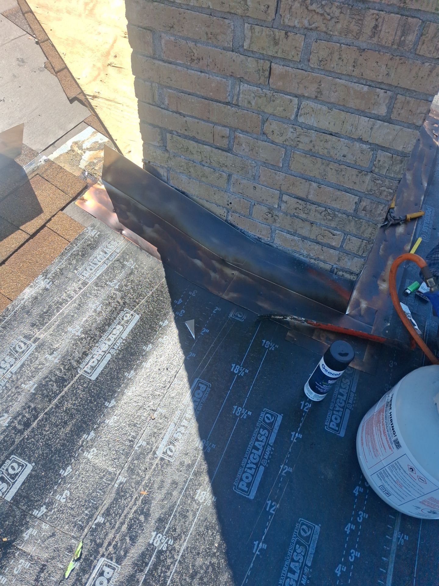 Chimneys need a Cricket.  by Bayfront Roofing and Construction