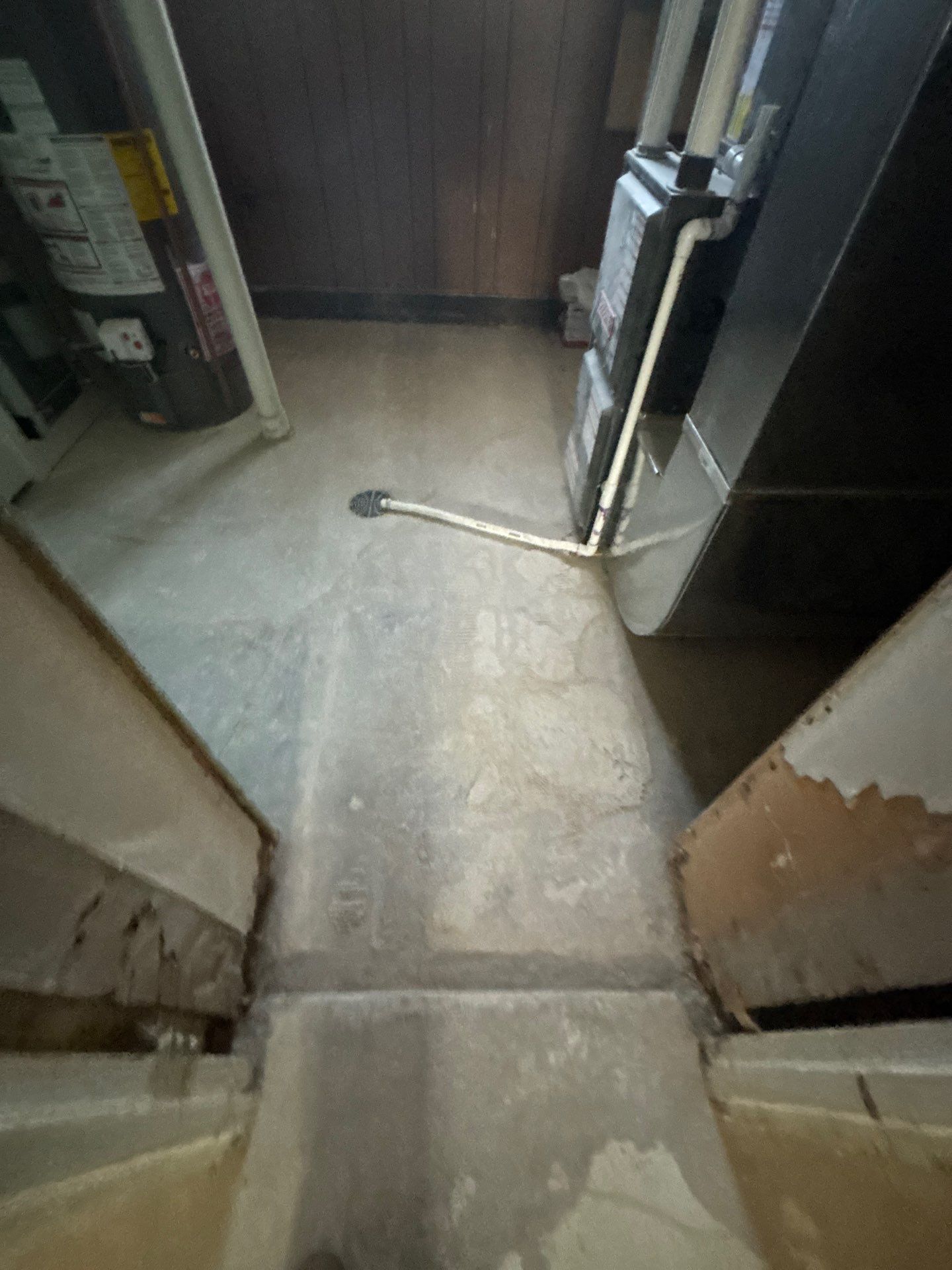Comprehensive Basement Concrete Floor Coating and Crack Repair in Sioux Falls by Select Painting, Coatings & Garage Cabinets