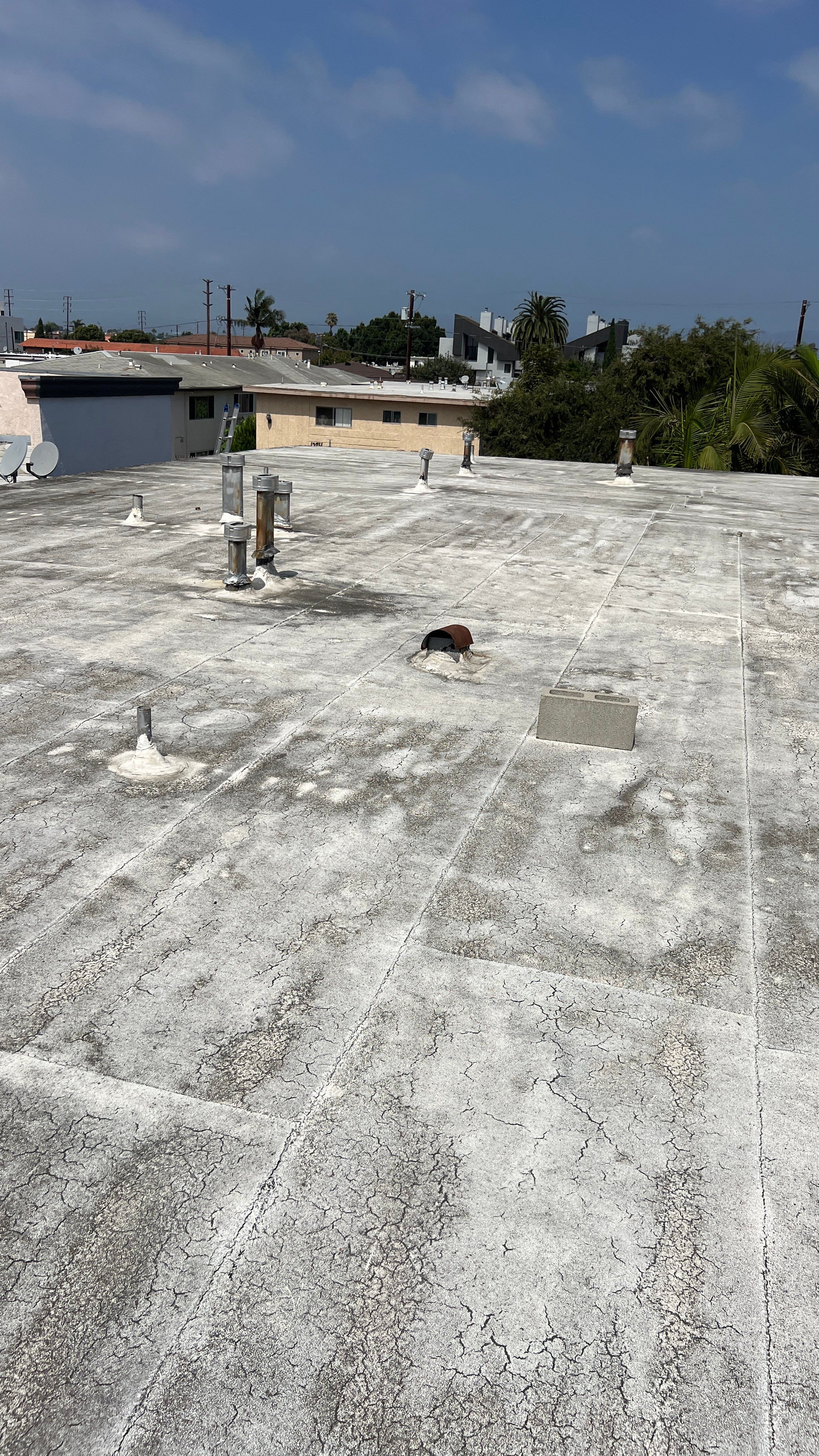Commercial Roofing Installation using Silicone Coating by Hull Brothers Roofing