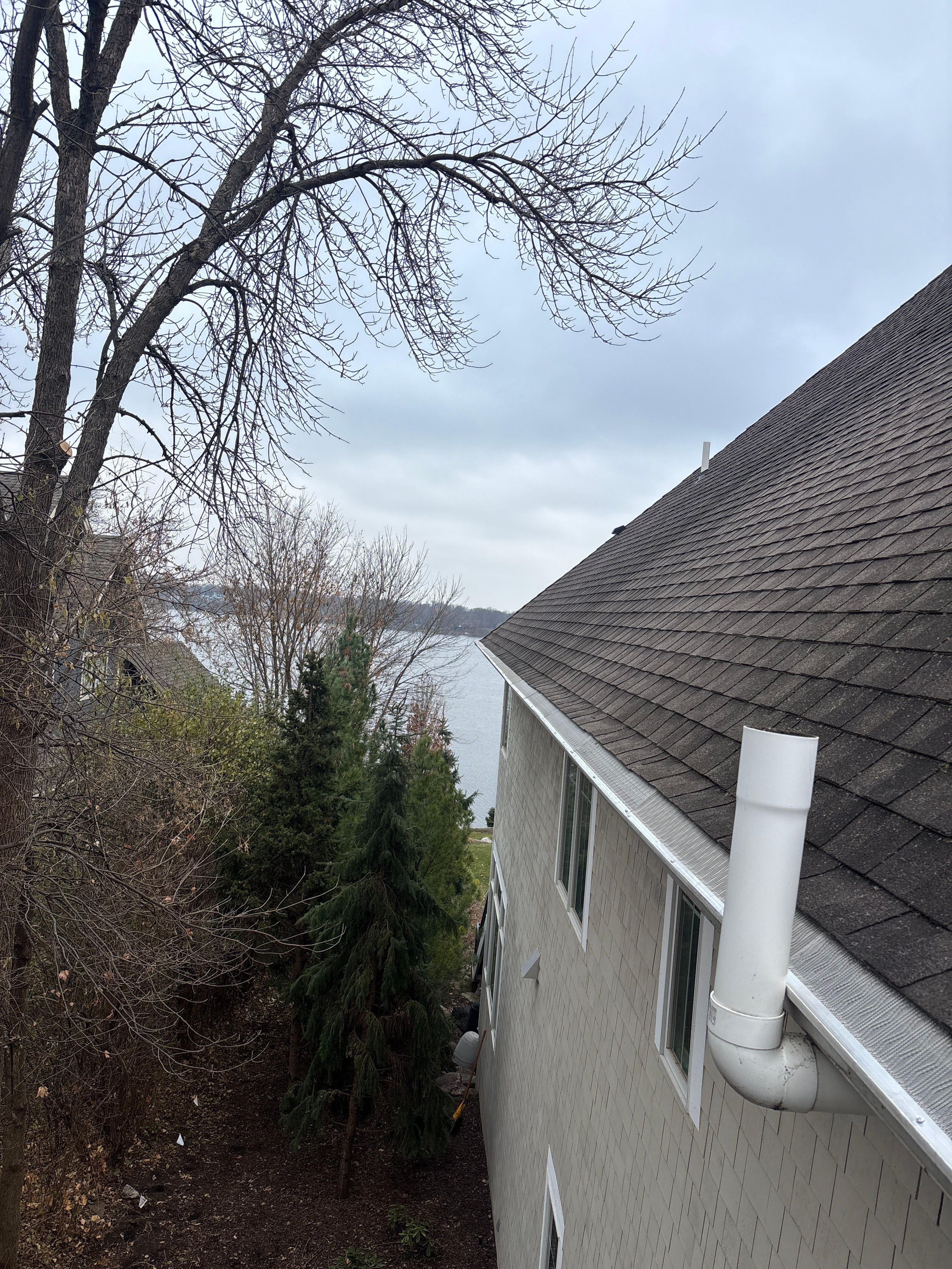 Gutter Cleaning and Leaf Blaster Pro Gutter Guard Installation – Minnetrista, MN by Next Level Seamless Gutters / Exteriors Inc.