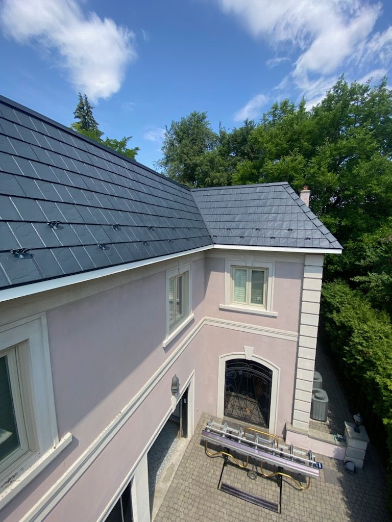 Residential Roofing Installation using Vicwest True Natuer. Metal Shingle by Jay Carter Roofing & Sheet Metal