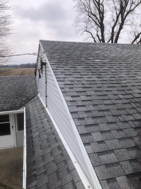 Storm damage roof replacement by Nitro Roofing and Construction