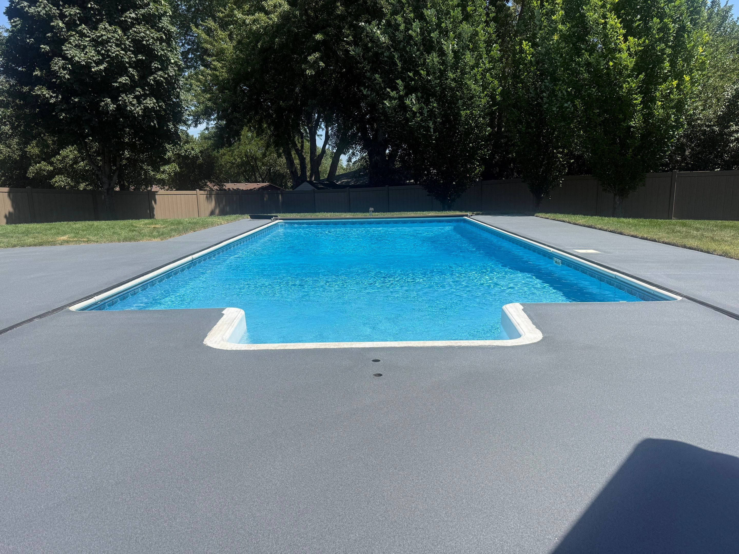 Residential Pool Deck Resurfacing in Sioux Falls by Select Painting, Coatings & Garage Cabinets