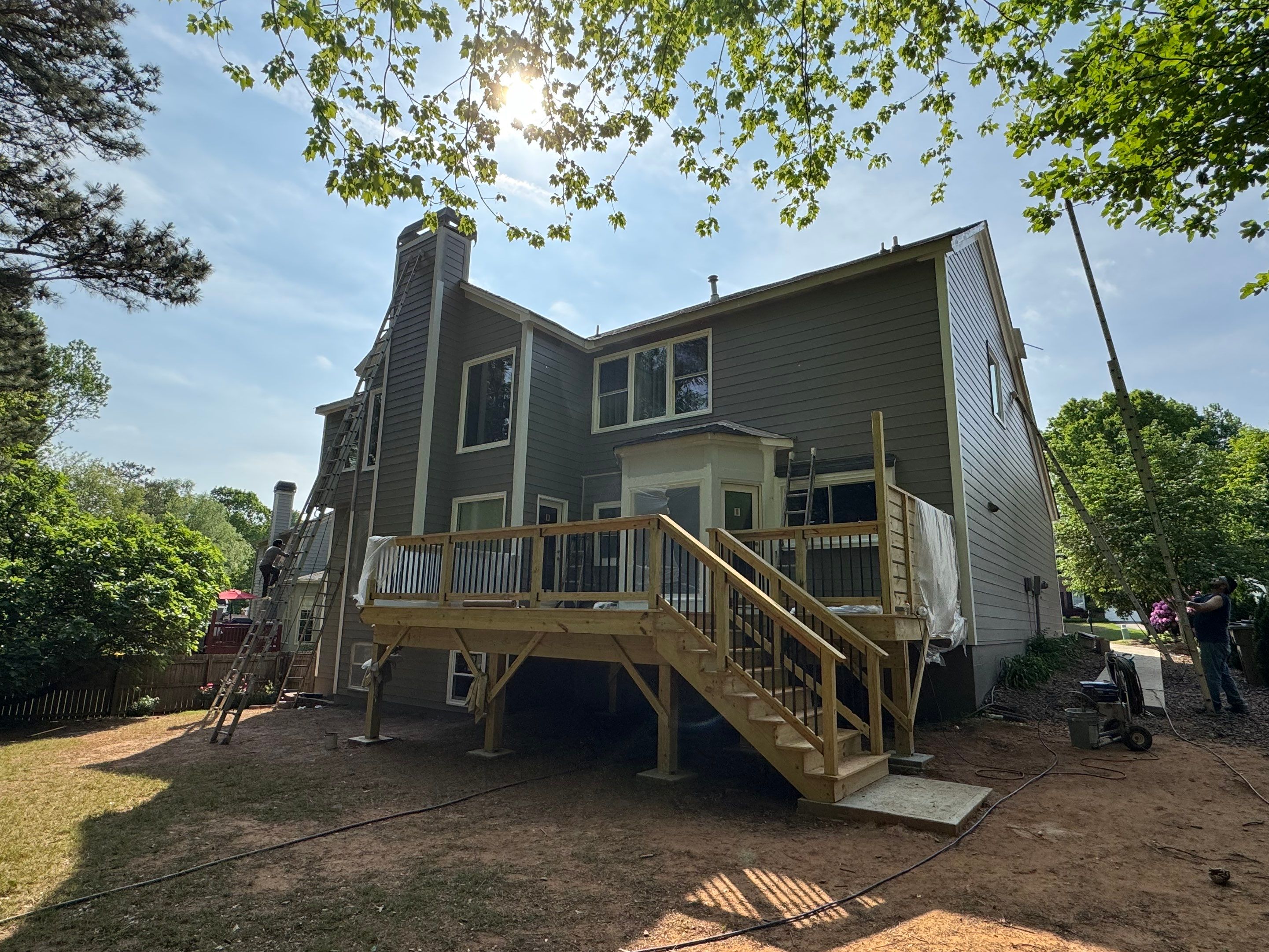 Full Exterior Siding Replacement and Custom Deck in Johns Creek by Swift Home Renovations 