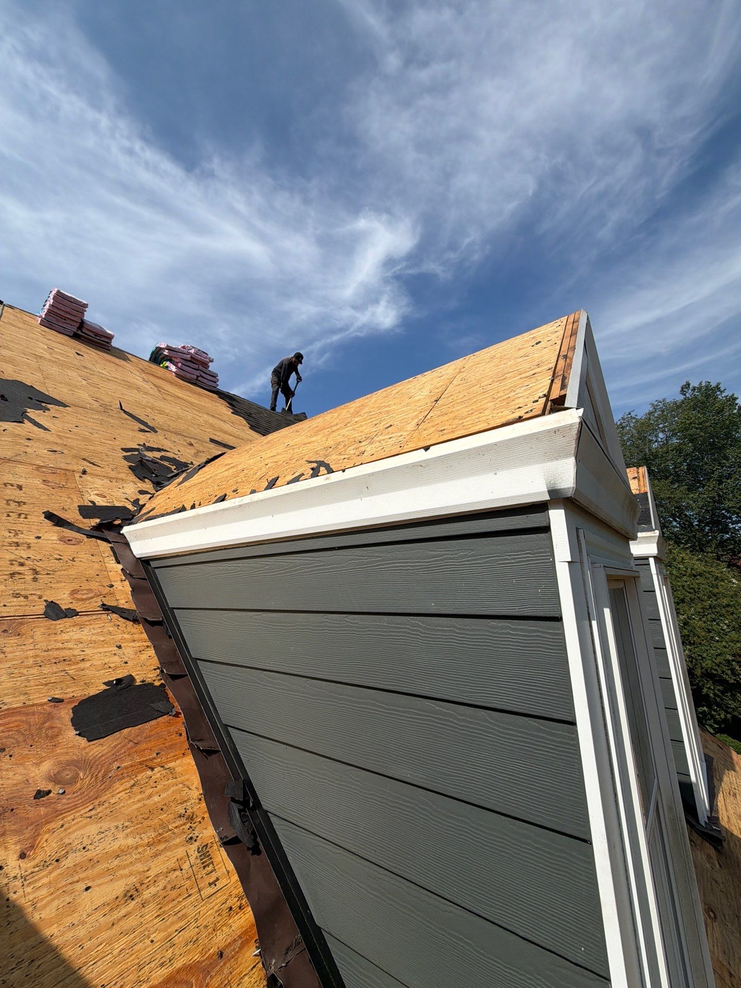 Roof Replacement and White Gutter Installation in Gloucester by Cade Construction