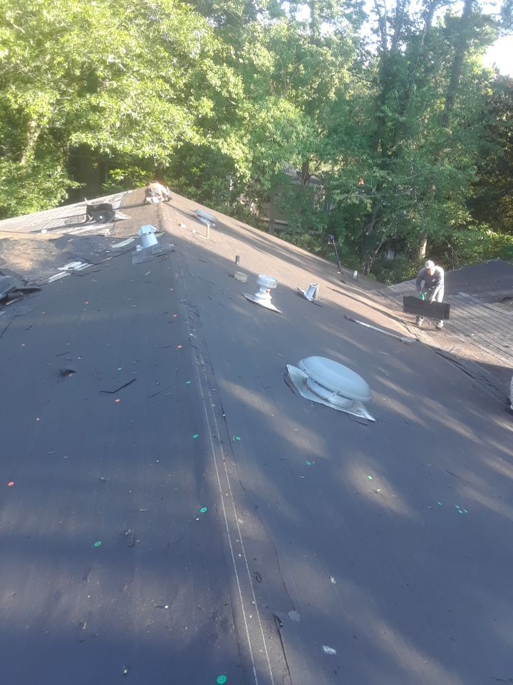 Commercial Roofing Installation using Roof Replacement by American Roofing & Construction LLC