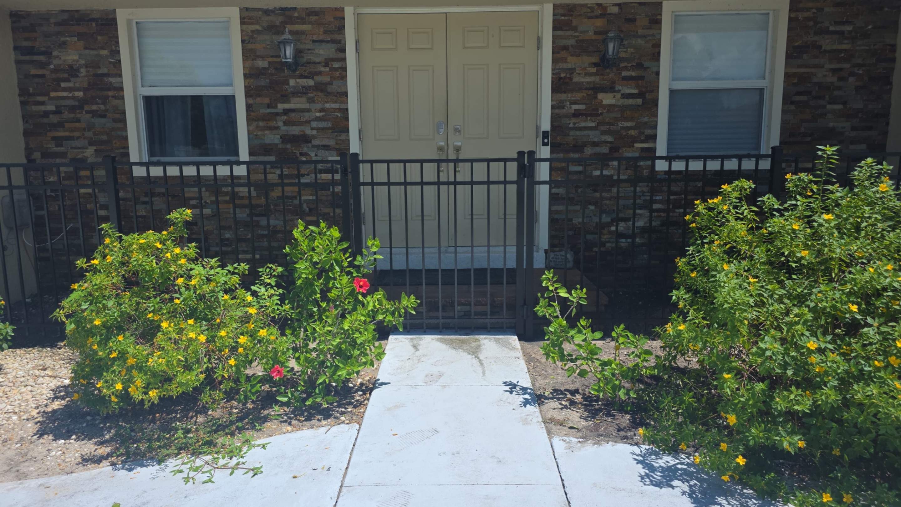 Black Aluminum Picket Fence Installation in Marco Island by True Fence LLC