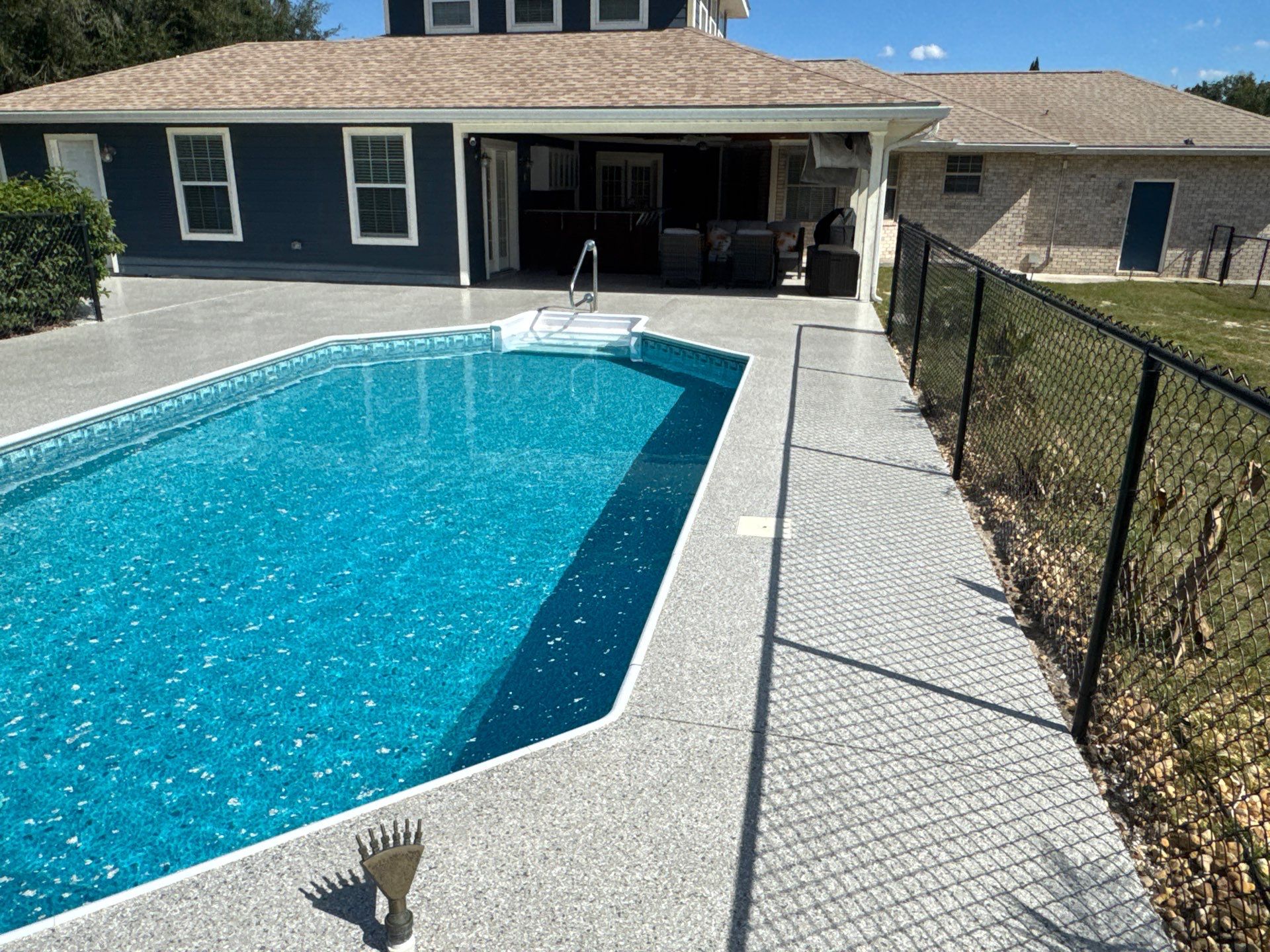 Pool Deck in Lake City, FL in Mount Everest by Cross Creek Concrete Coatings