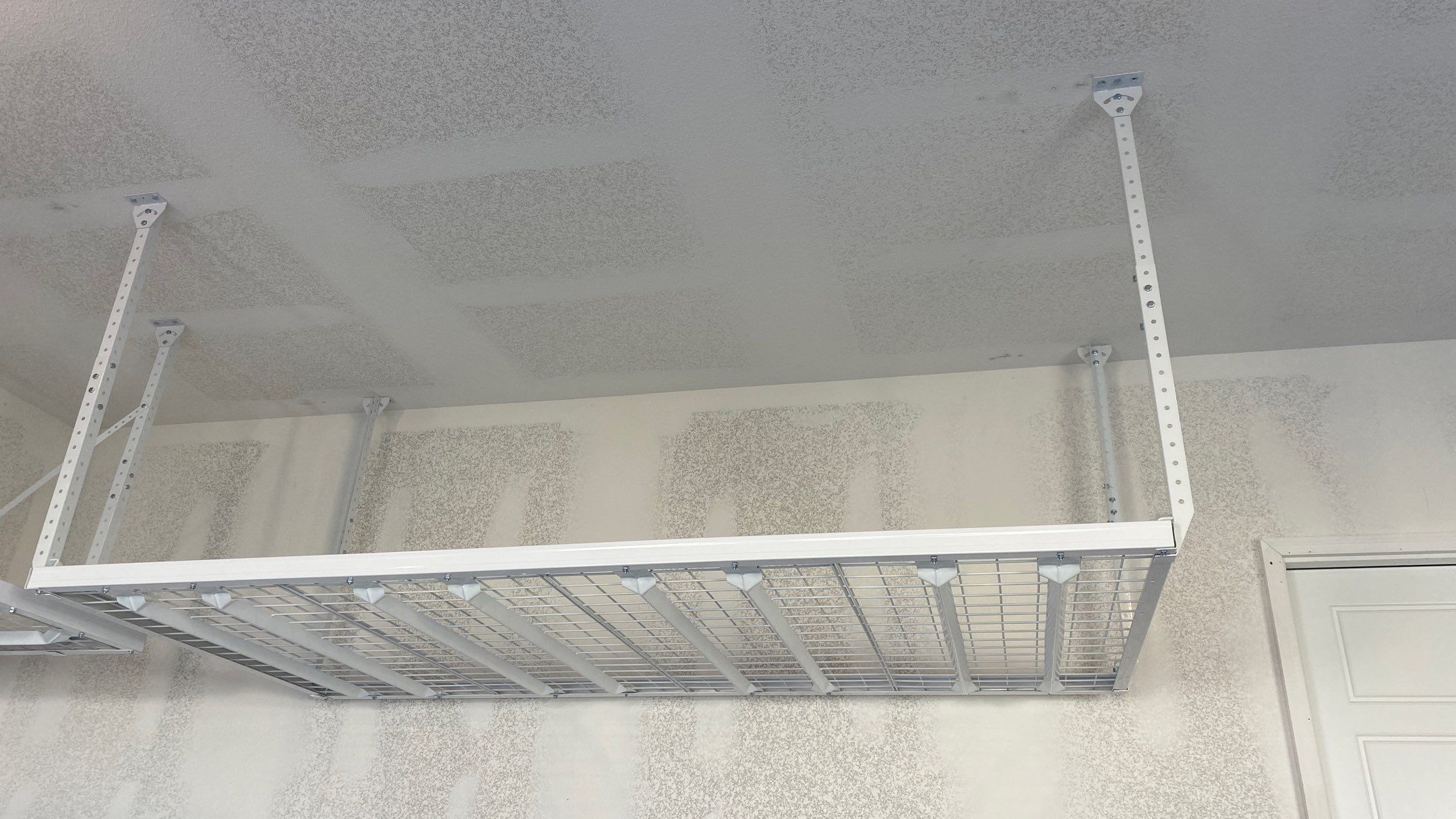 Roger D. adds ceiling racks to his garage! by Banner Garage