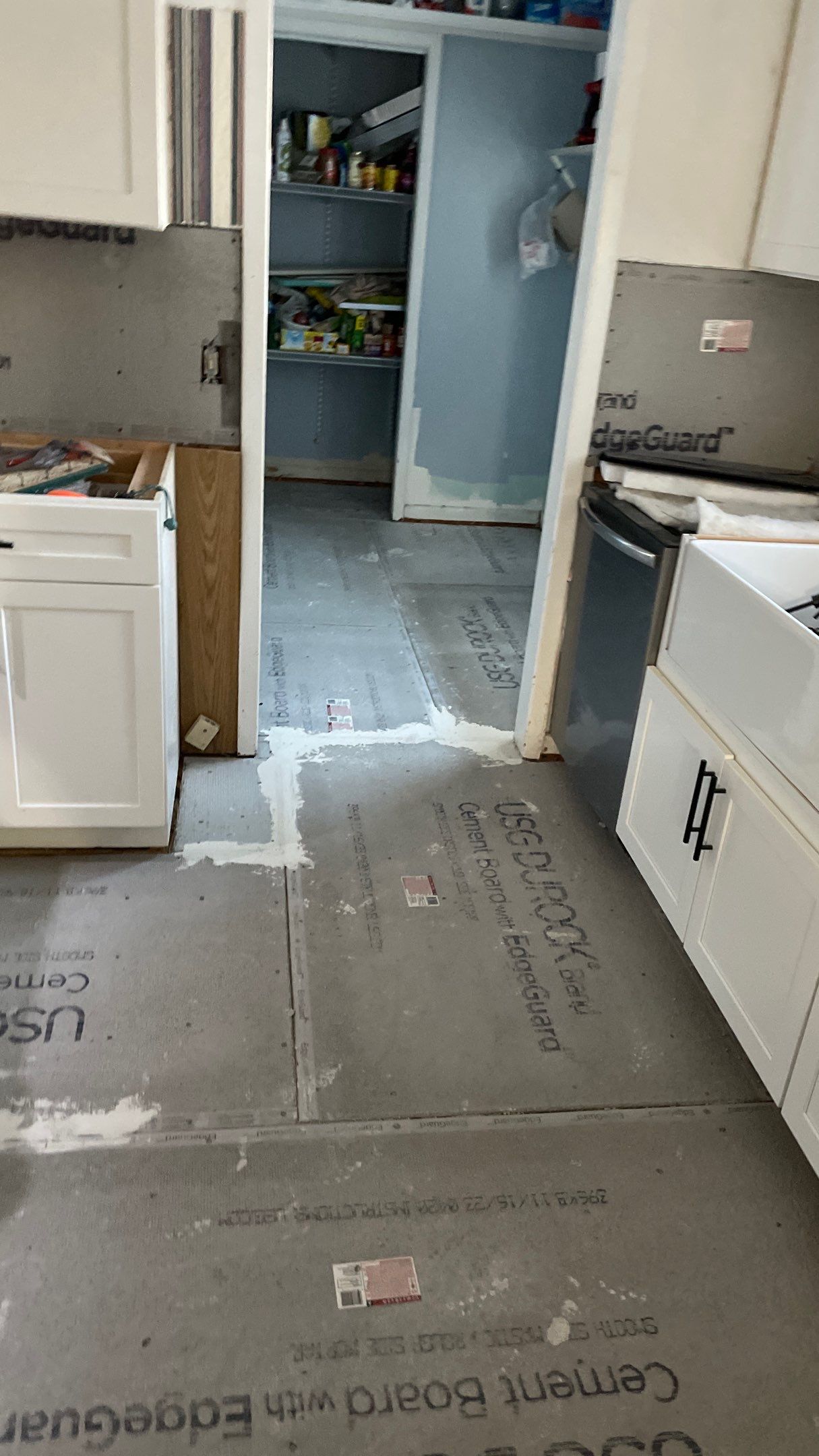 Kitchen Backsplash and Herringbone Tile Floor Remodel by Footprints Floors of Coastal Carolina