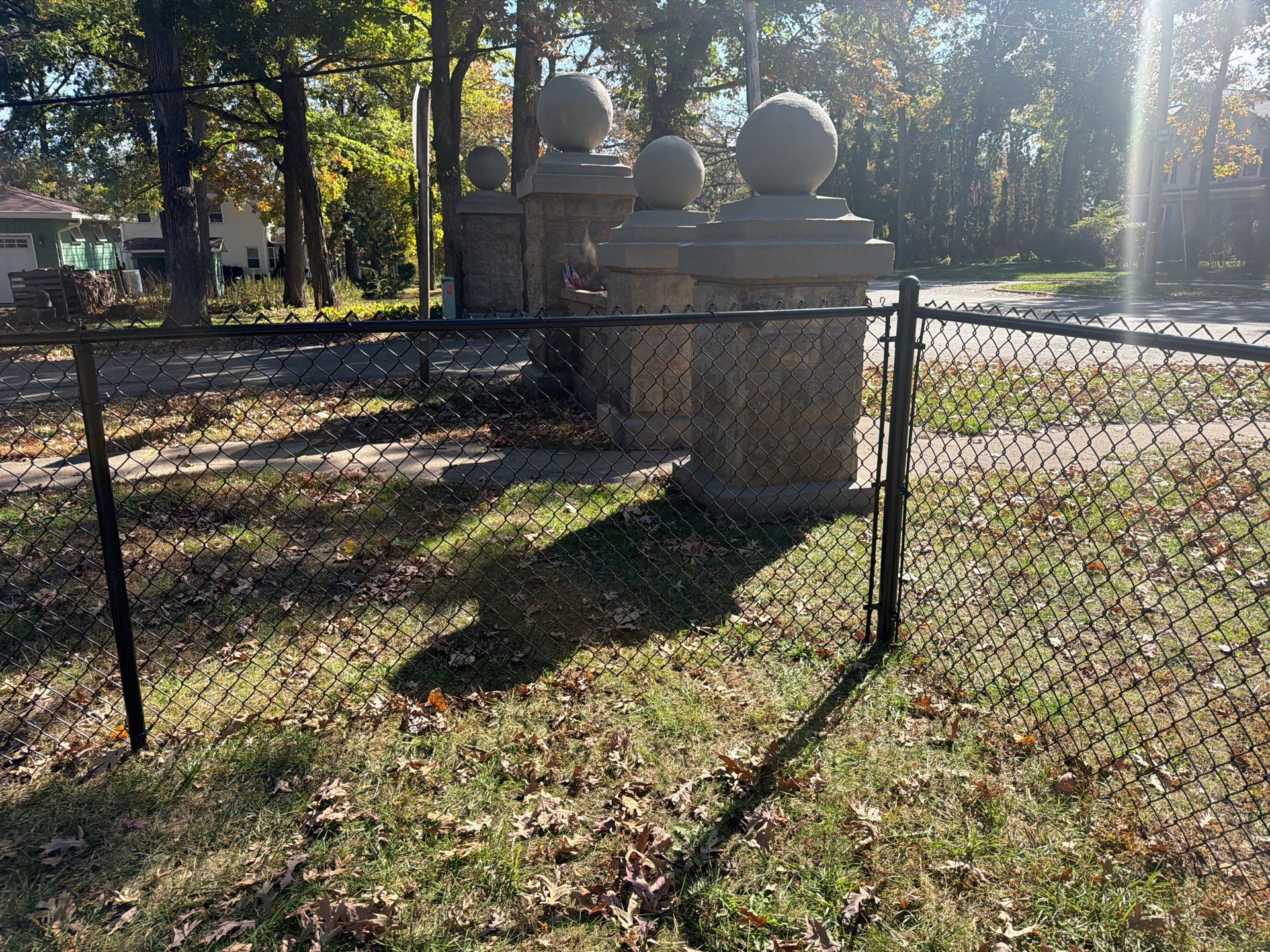 Residential Black Chain Link Fencing in Cedar Falls by Perfect Picket Fence and Stain